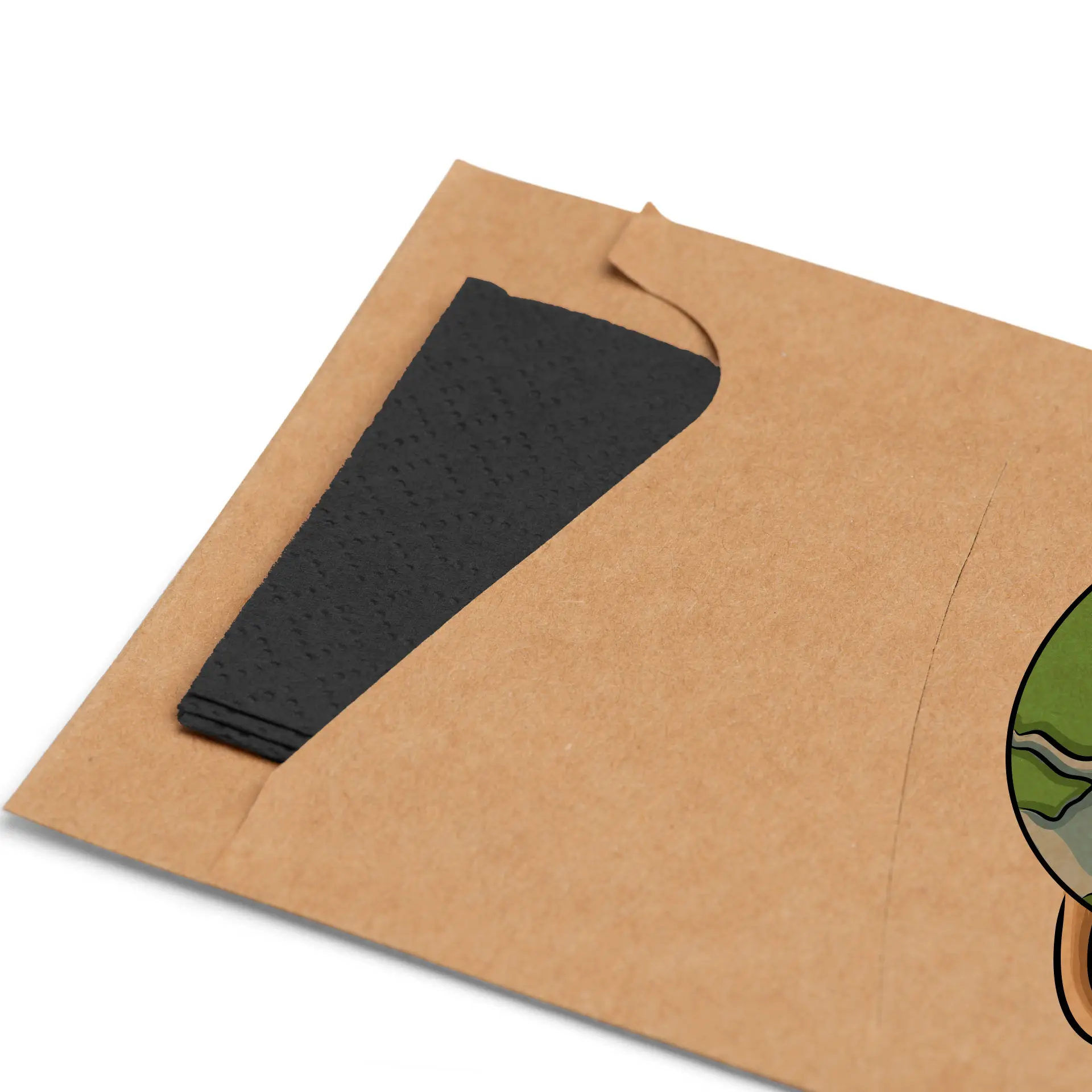 Brown kraft cutlery sleeve with integrated black napkin, displaying a corner fold.