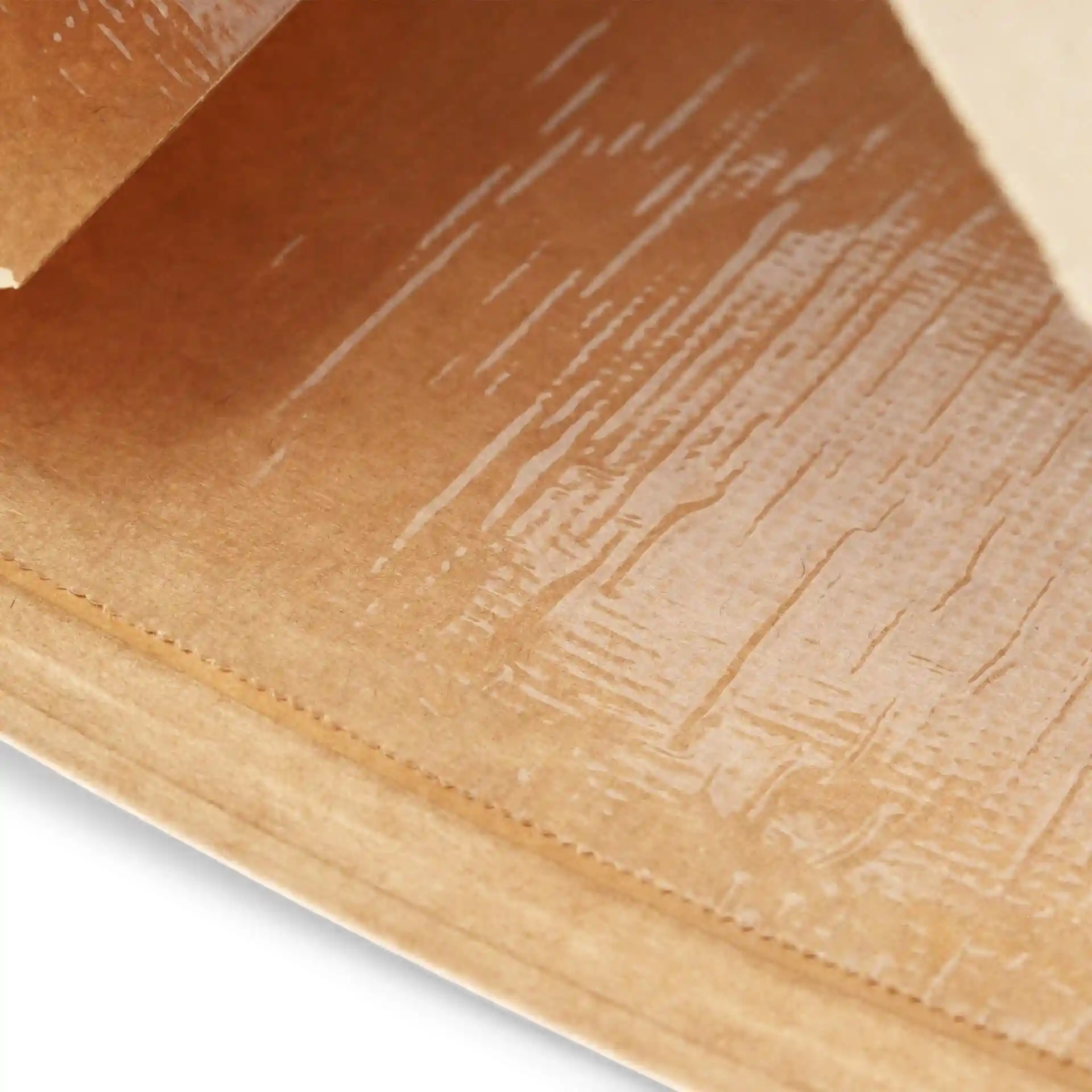 Close-up of the interior of a brown kraft paper bag with a glossy coating and a viewing window.