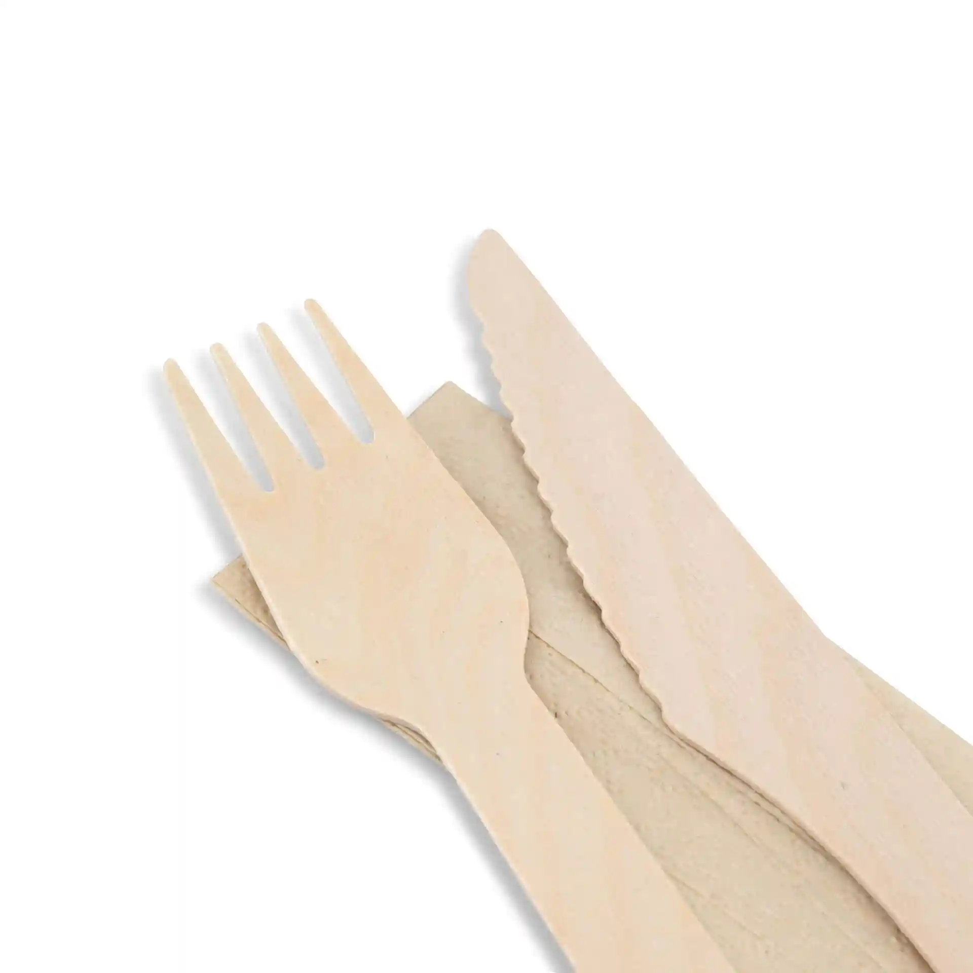 Wooden knife and fork on a serviette, arranged on a plain background.