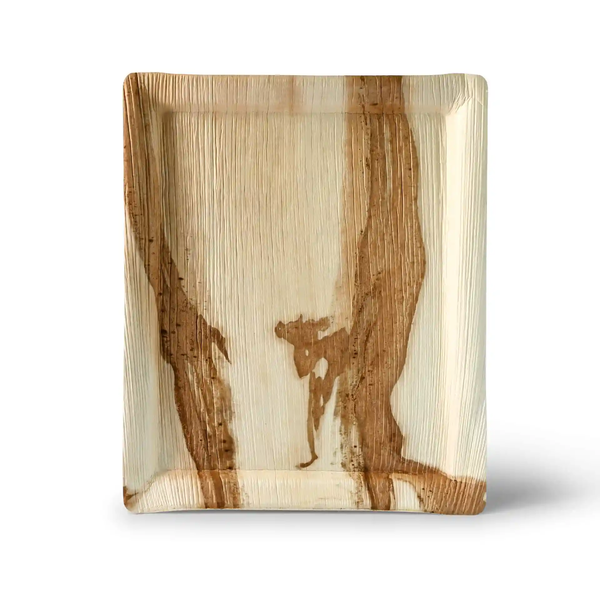 Rectangular palm leaf tray with a natural brown pattern, measuring 32.5 x 26.5 cm and 2.5 cm in height.