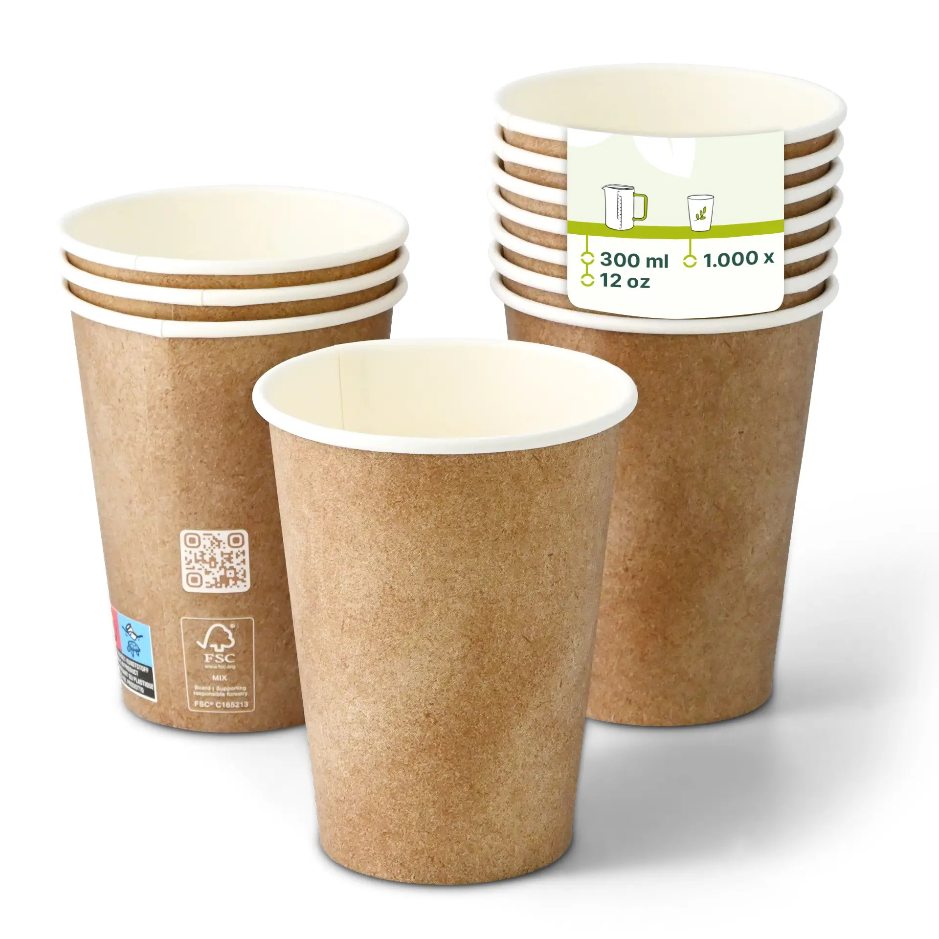 One brown paper cup in focus with a white inner layer; several similar cups stacked behind with a PLA coating for drinks.