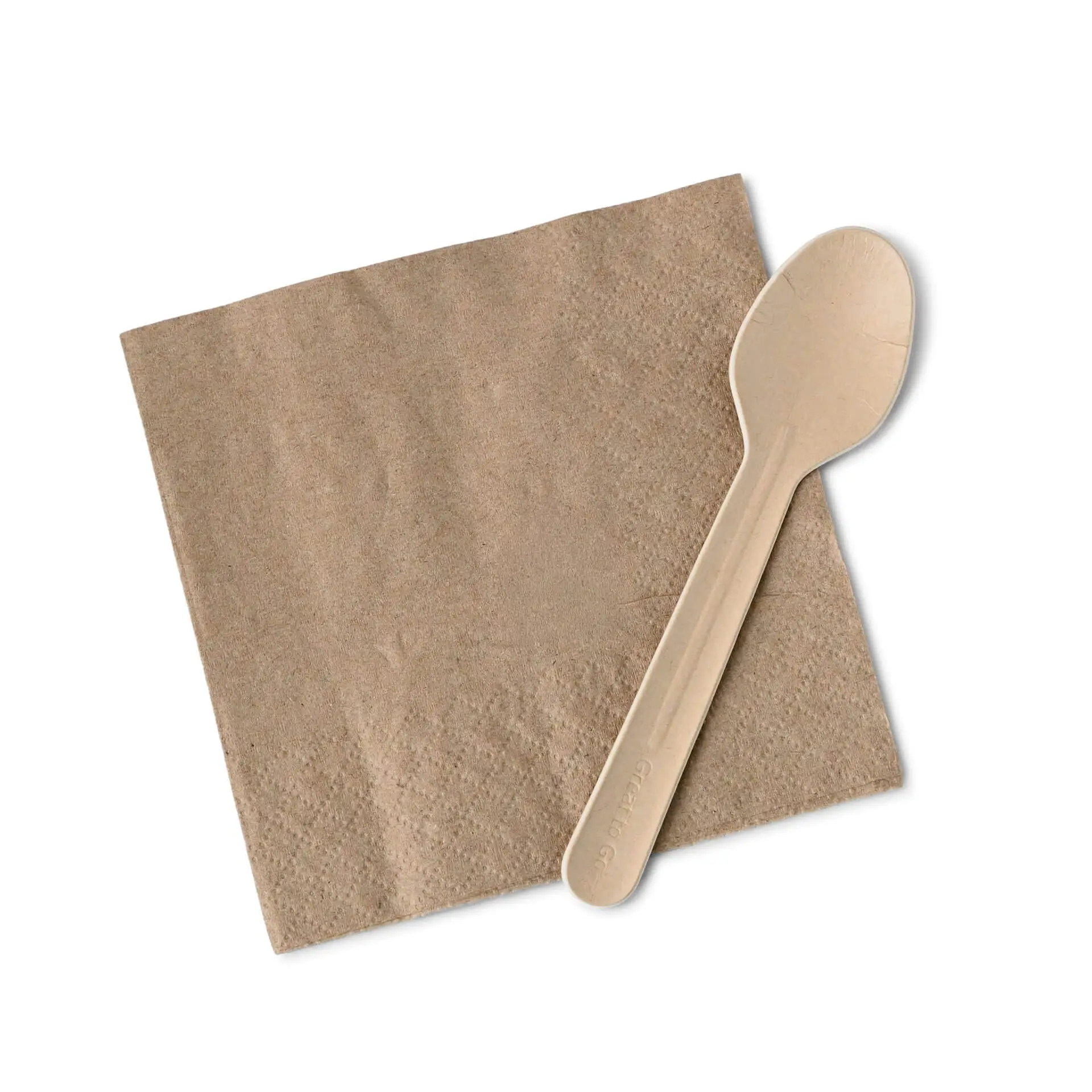 Braune Papierserviette mit einem Papiersüßlöffel darauf. Die Serviette hat ein gedrucktes Recycling-Symbol.