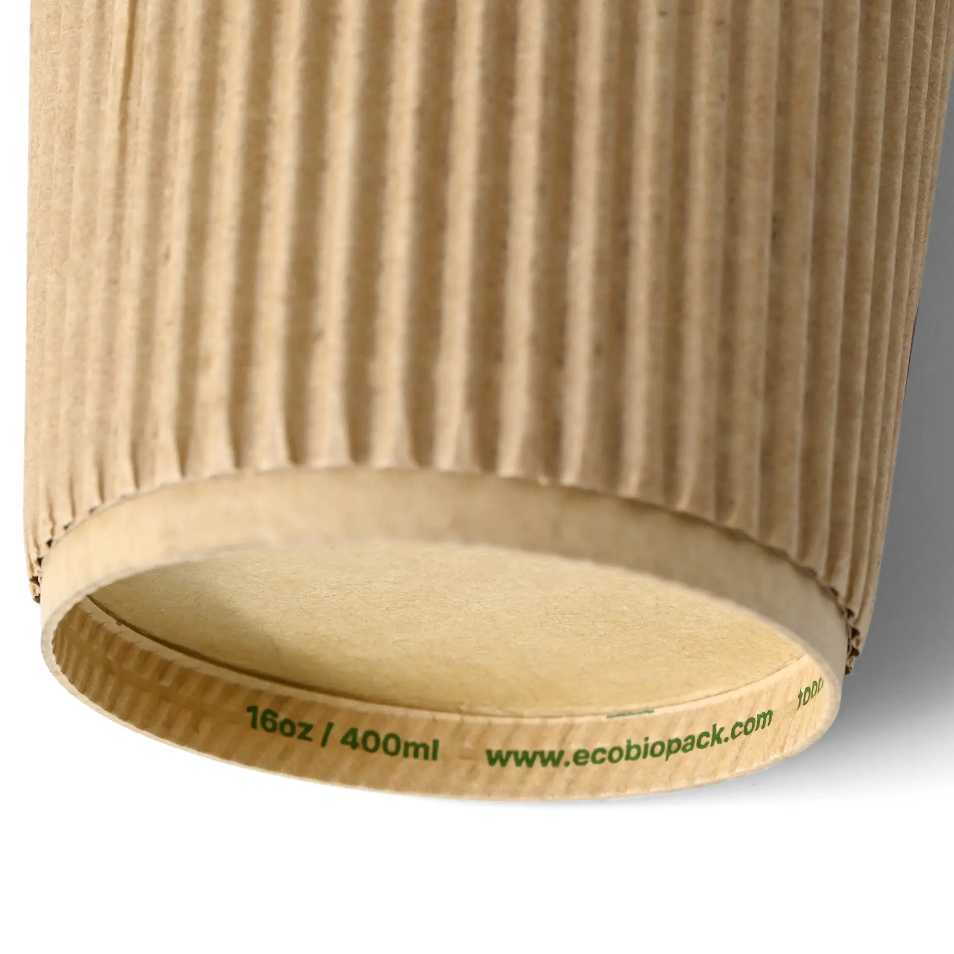 Brown triple-walled disposable coffee cup with ribbed texture, 16 oz size, featuring a PLA inner coating.