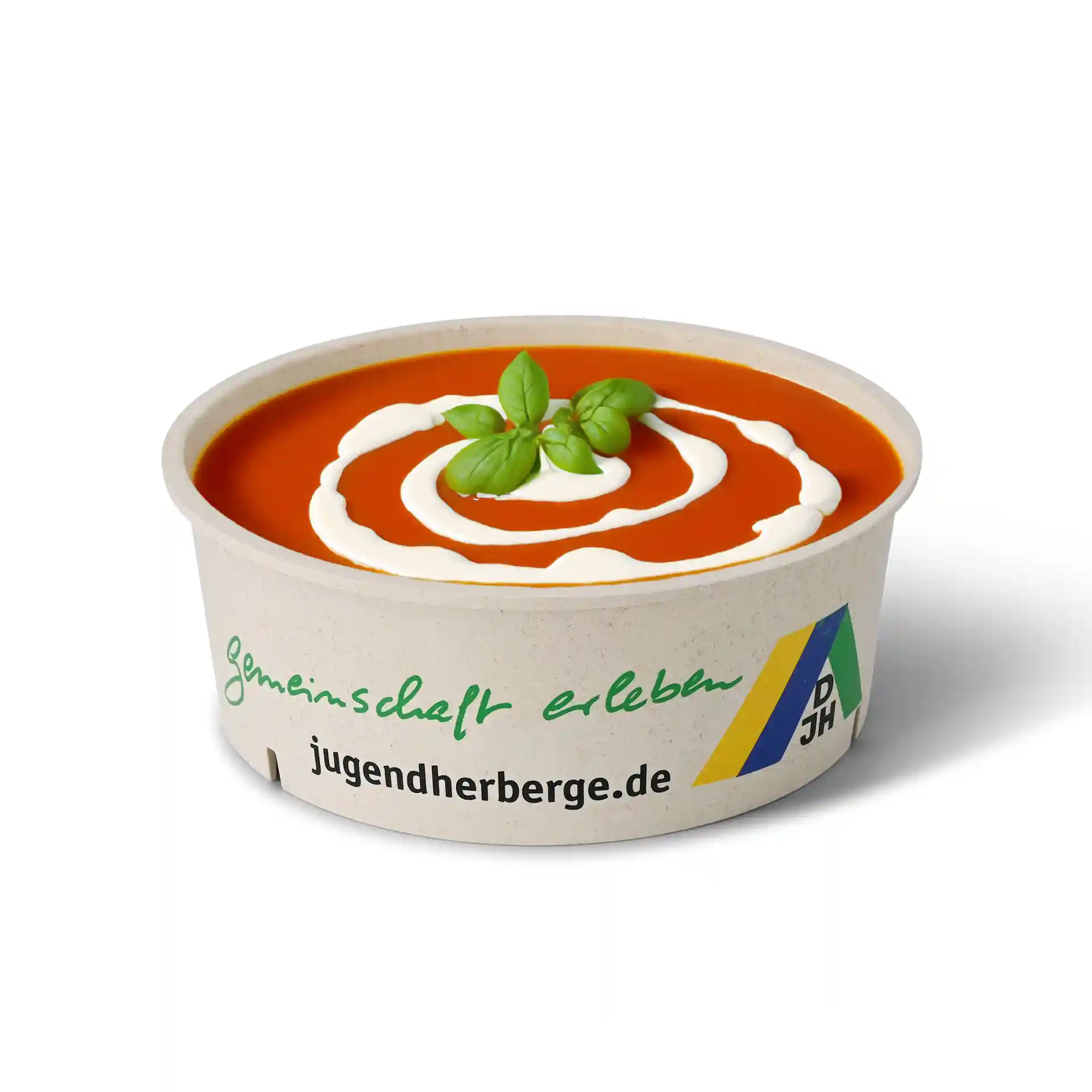Round reusable bowl with cream-white color, filled with tomato soup, topped with cream swirl and basil leaf.