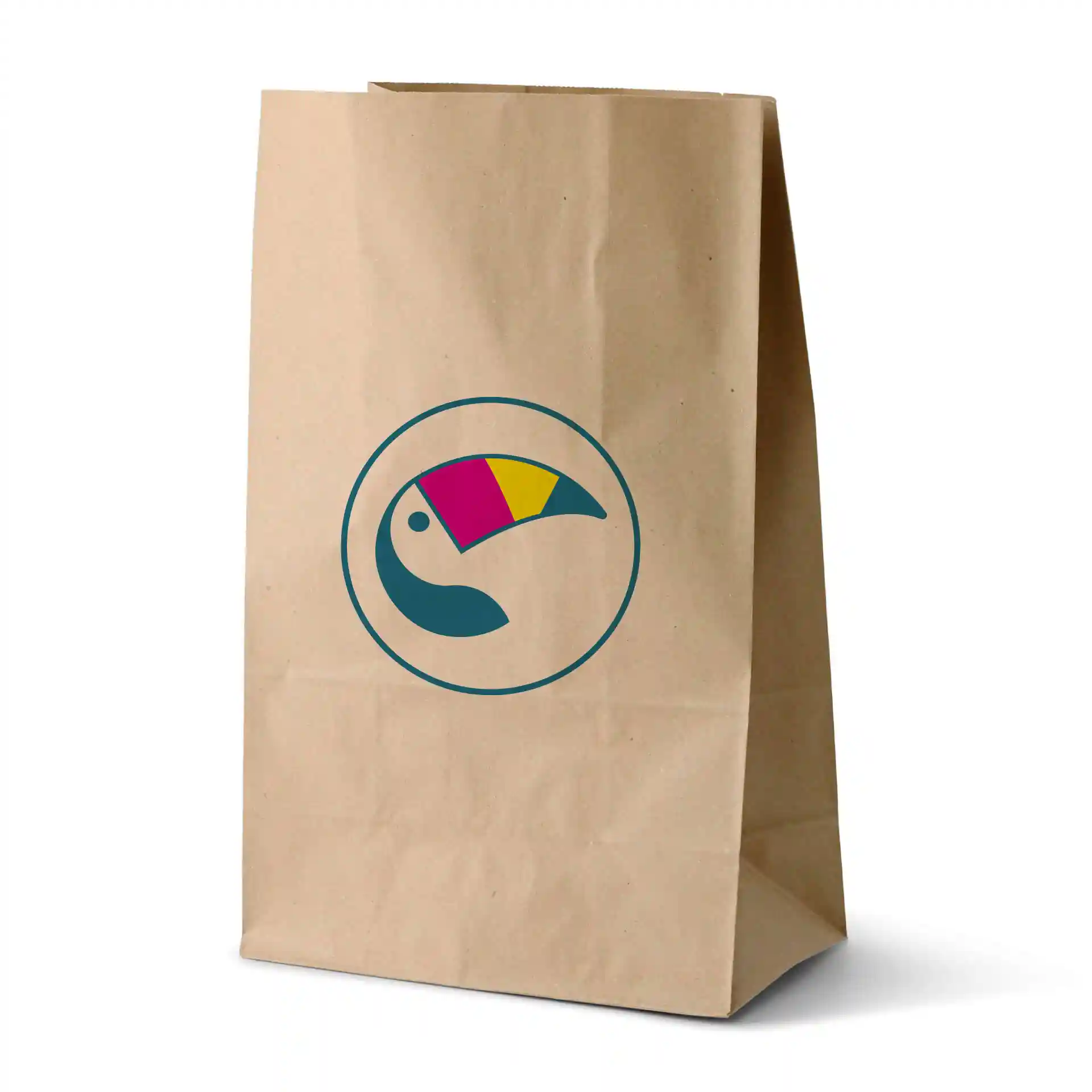 Brown printed paper bag with a circular toucan logo in blue, pink, and yellow. Dimensions are 22 x 12 x 36 cm.