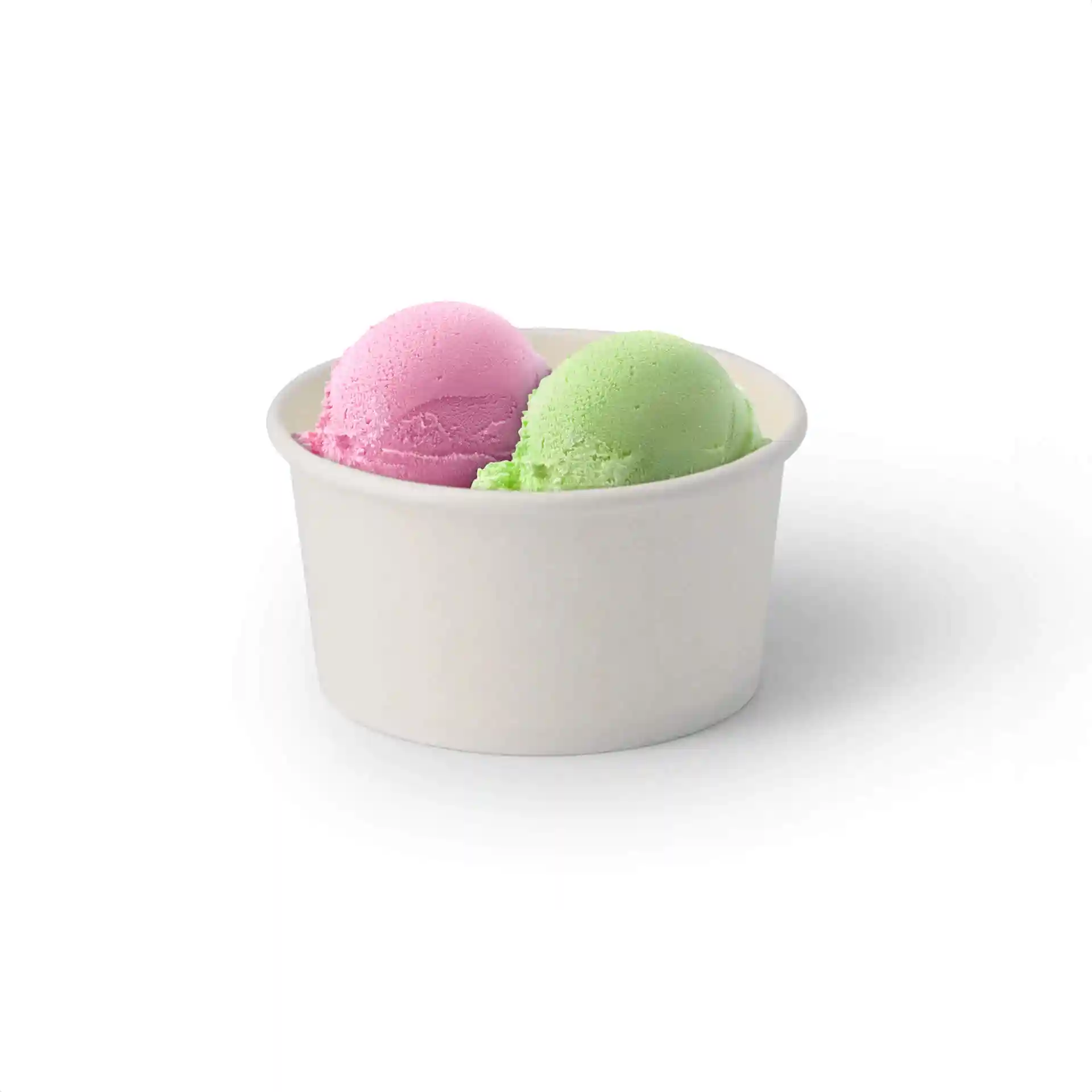 White cardboard cup containing two scoops of ice cream, one pink and one green, on a plain background.