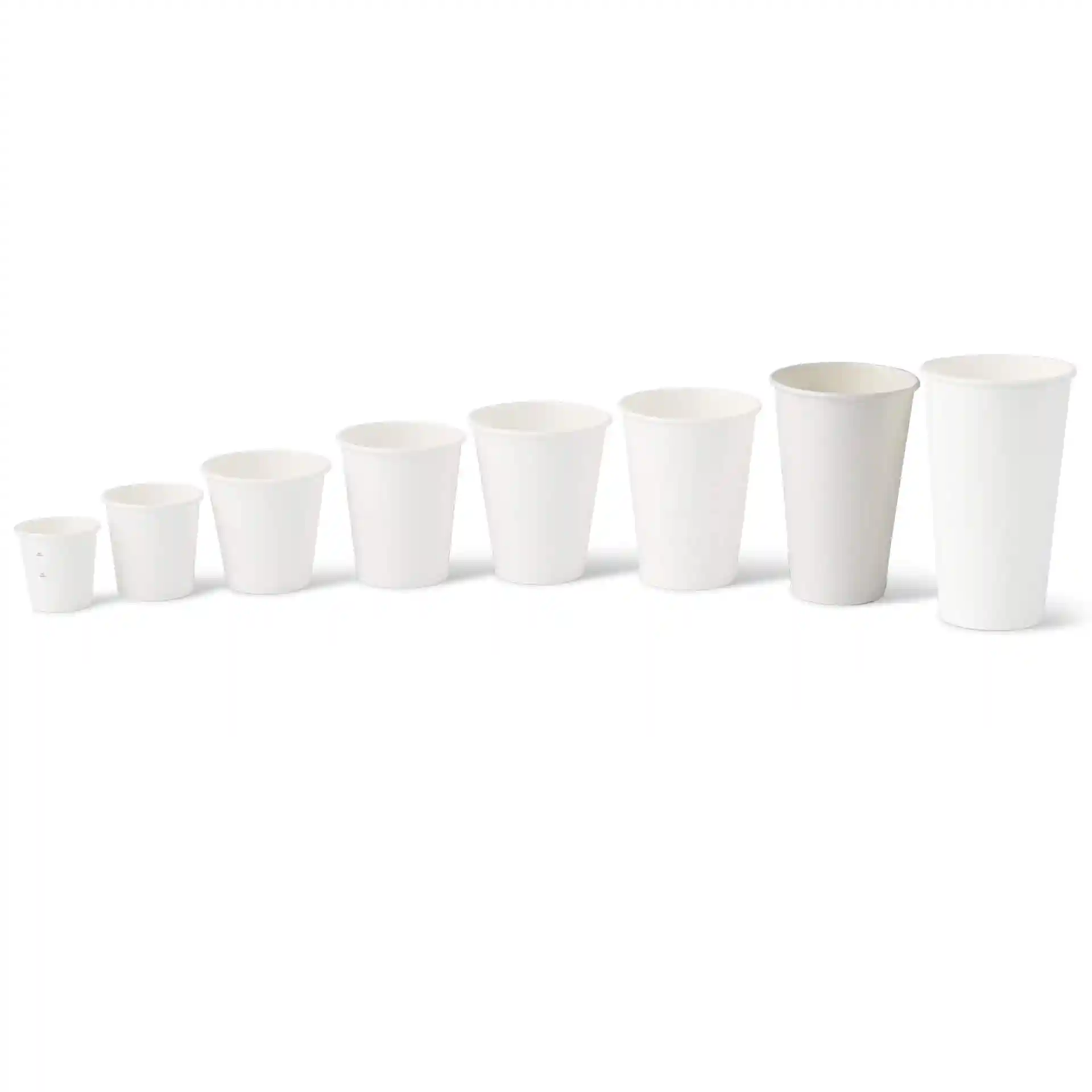 Set of eight white paper cups in varying sizes, arranged from smallest to largest, on a plain background.