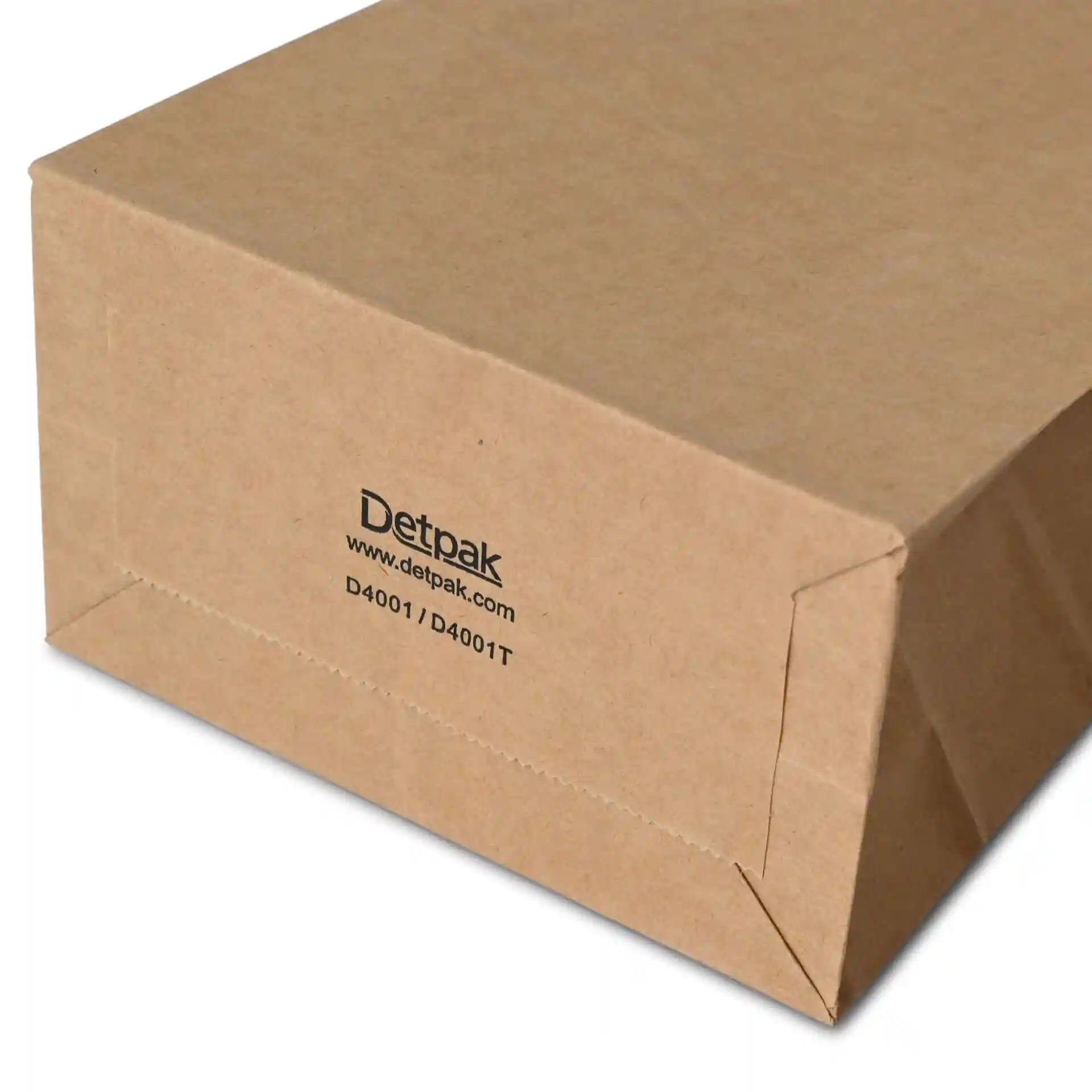 Brown kraft paper block bottom bag with a tin tie, showing the bottom corner and printed details.