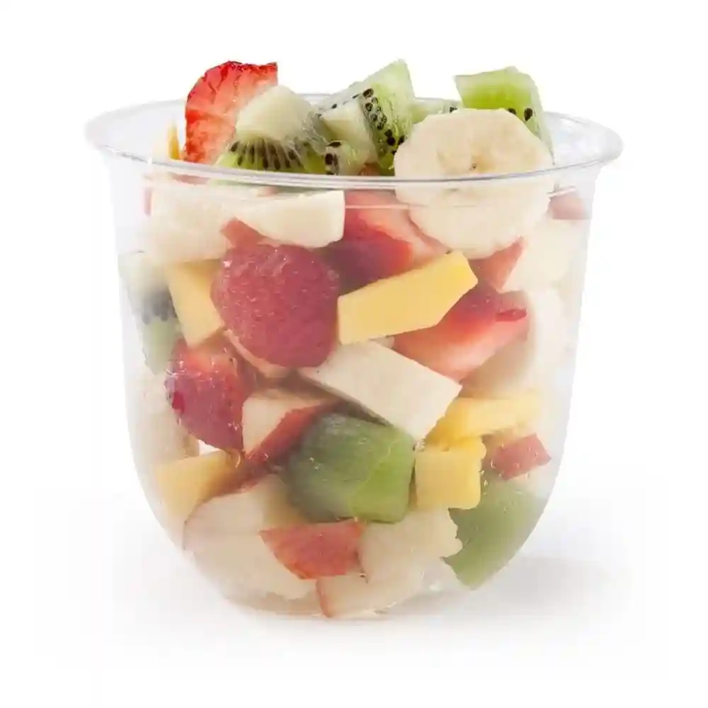 Transparent cup filled with mixed fruit including strawberries, bananas, kiwis, and mango.