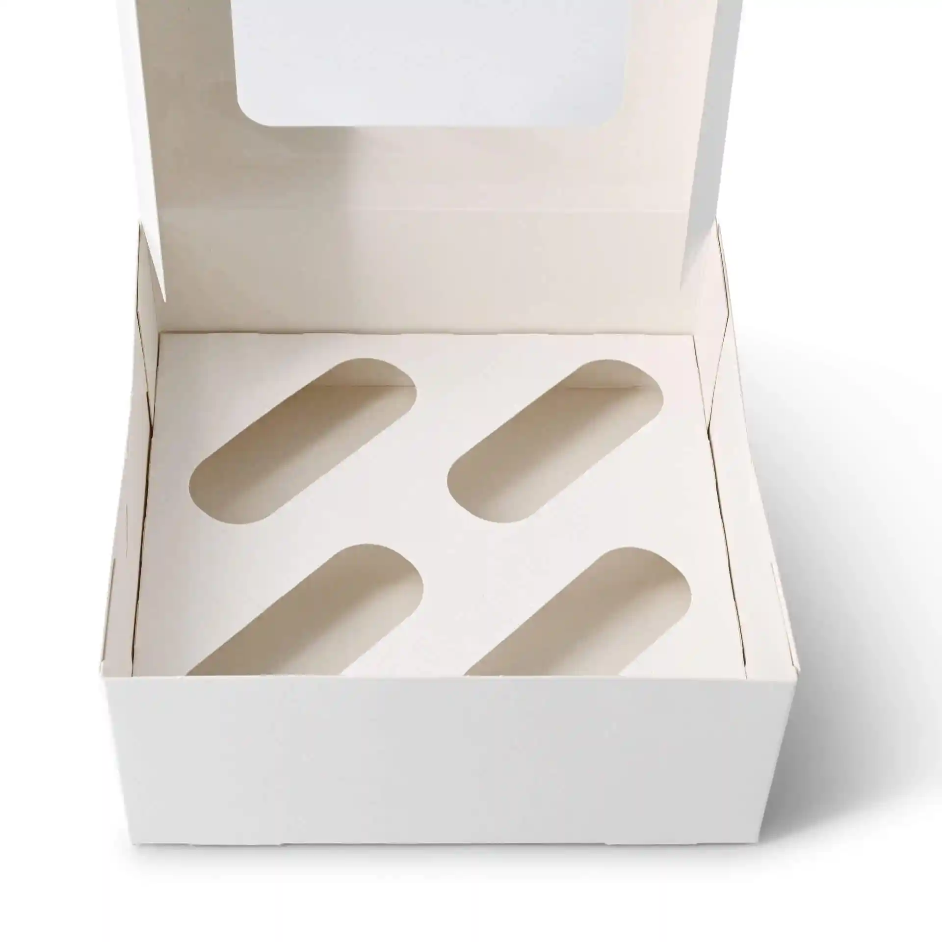 Weißer Kartoneinsatz für Cupcake-Boxen mit vier ovalen Ausschnitten.