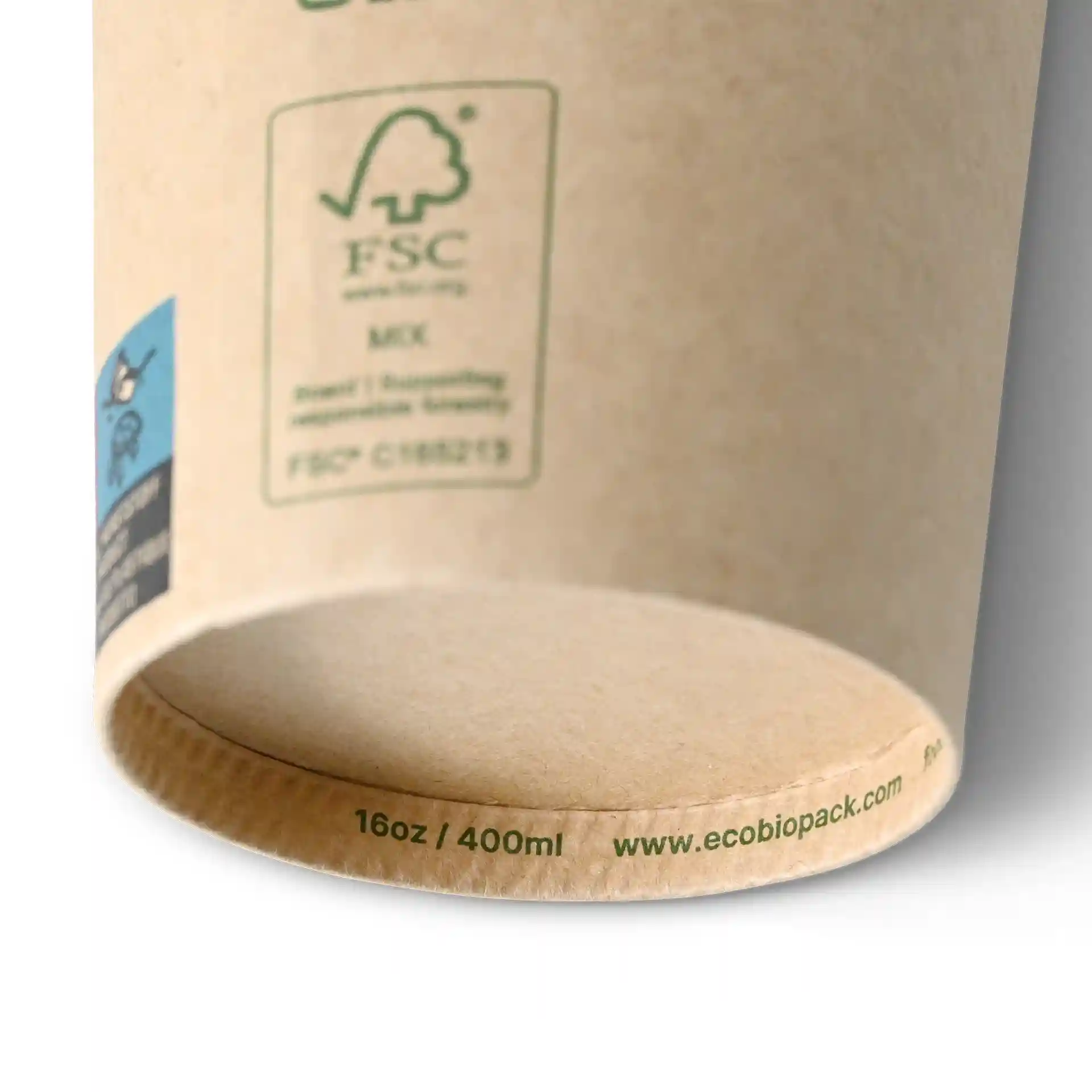 Brown paper cup with a diameter of 90 mm and a height of 135 mm, showing the bottom with volume markings.