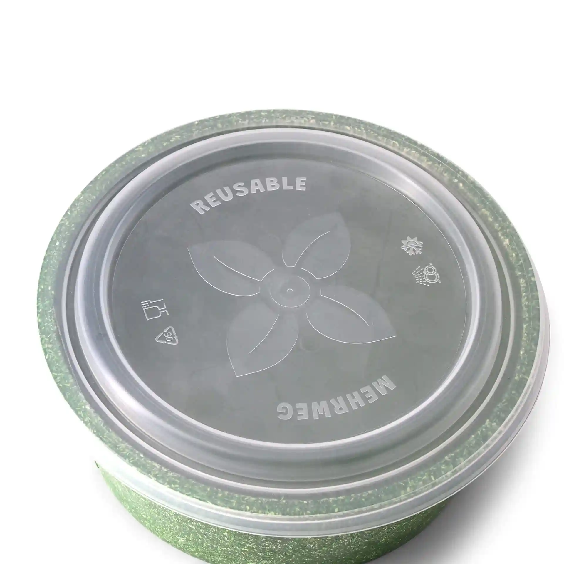 Transparent round bowl lid with a green rim, featuring a flower design and symbols on top.