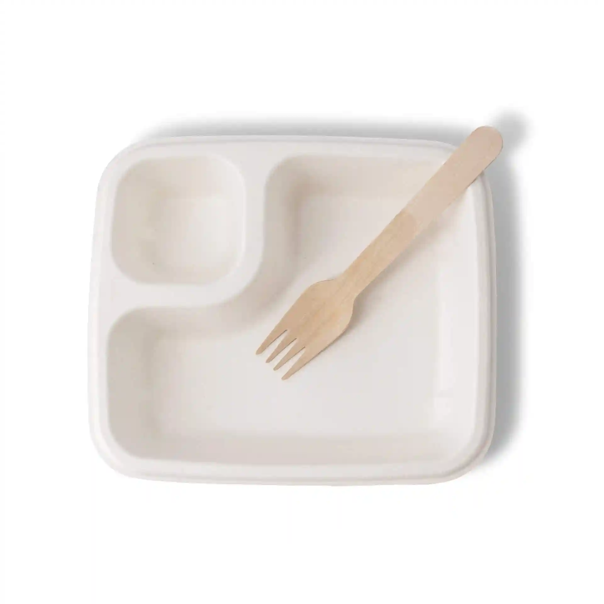 Rectangular white sugarcane dip plate with one compartment and a wooden fork placed beside it.