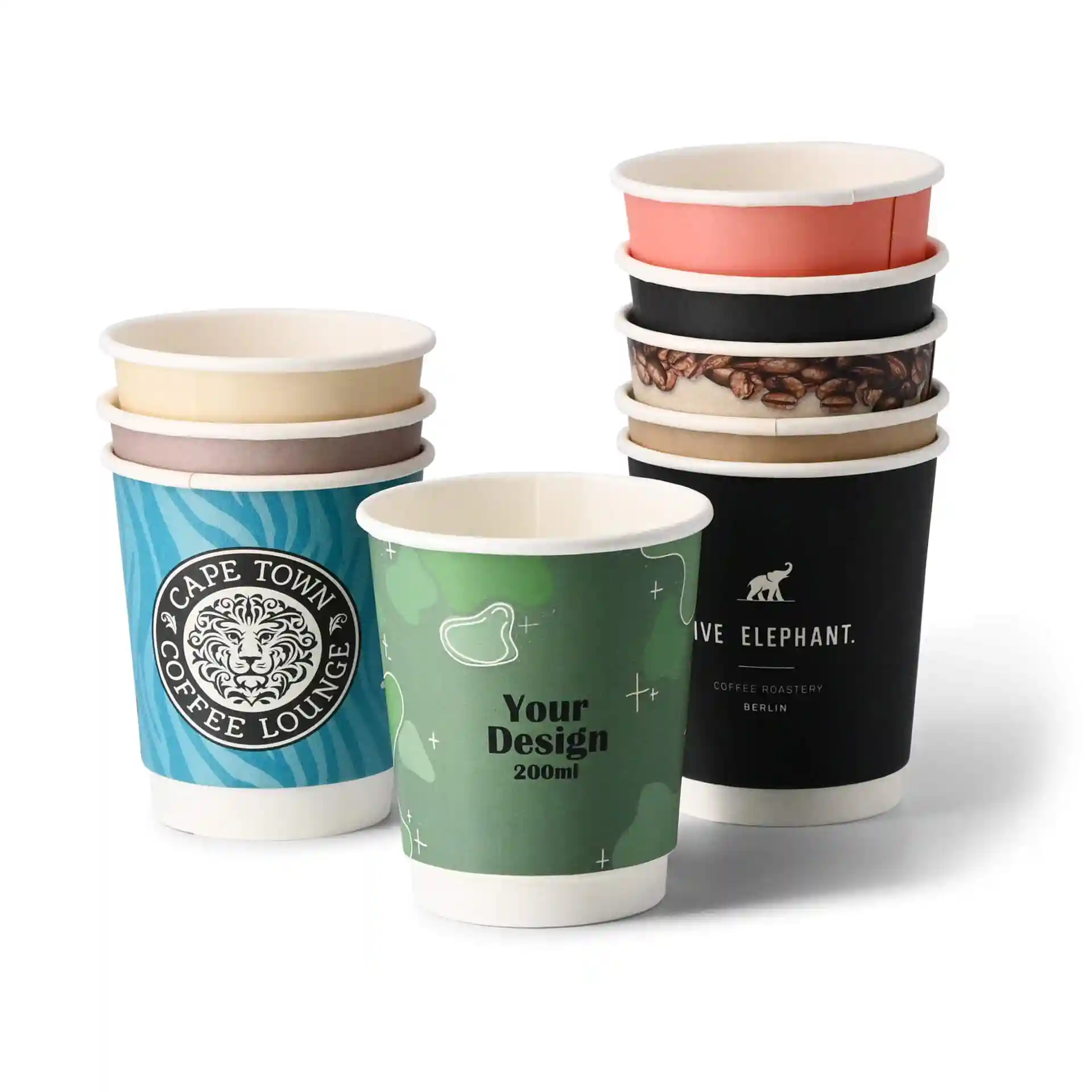 Stack of custom printed paper cups in various designs, including a green cup with a label and a blue cup with a logo.