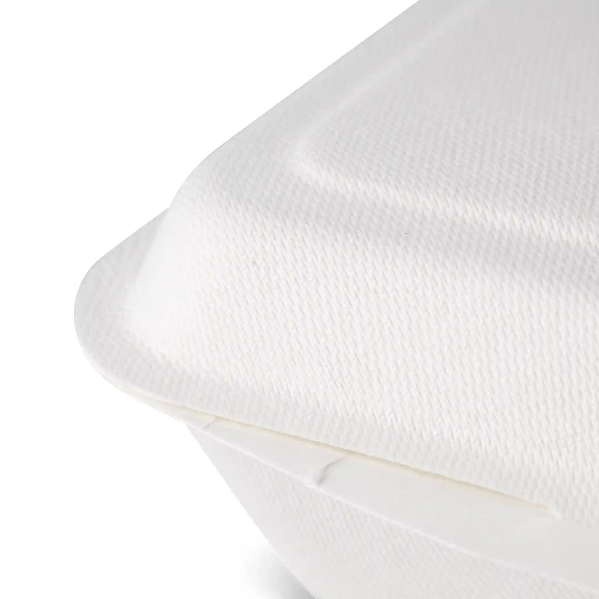 Close-up of a white rectangular sugarcane food container with a hinged lid and textured surface.