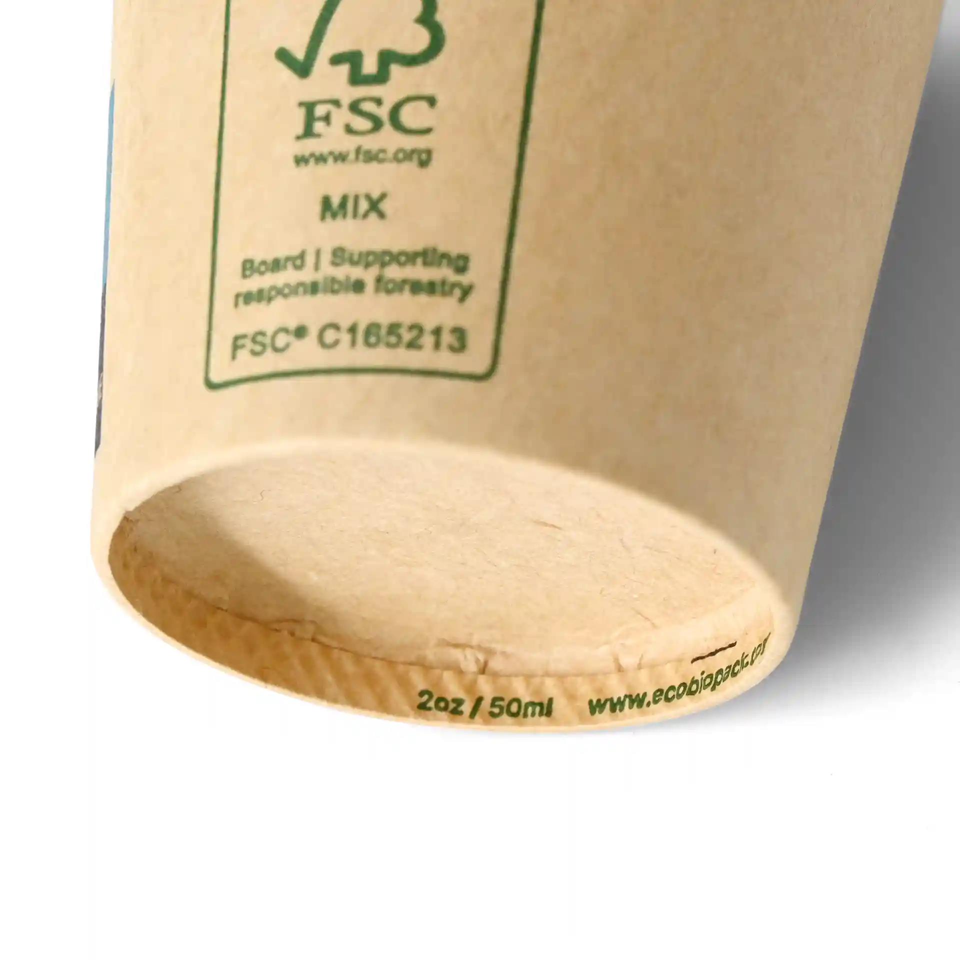 Brown paper cup with a diameter of 50 mm, showing the bottom and a green certification symbol.