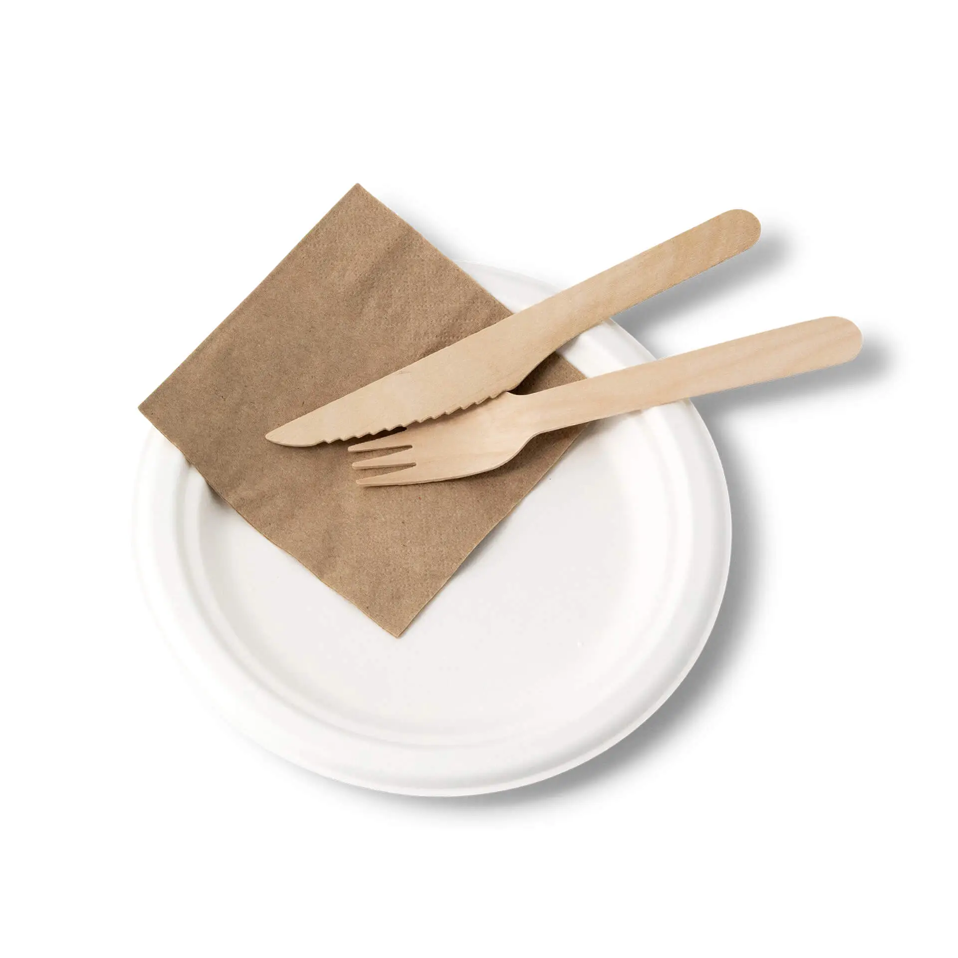 Round sugarcane plate with a brown napkin, wooden knife, and fork placed on top.