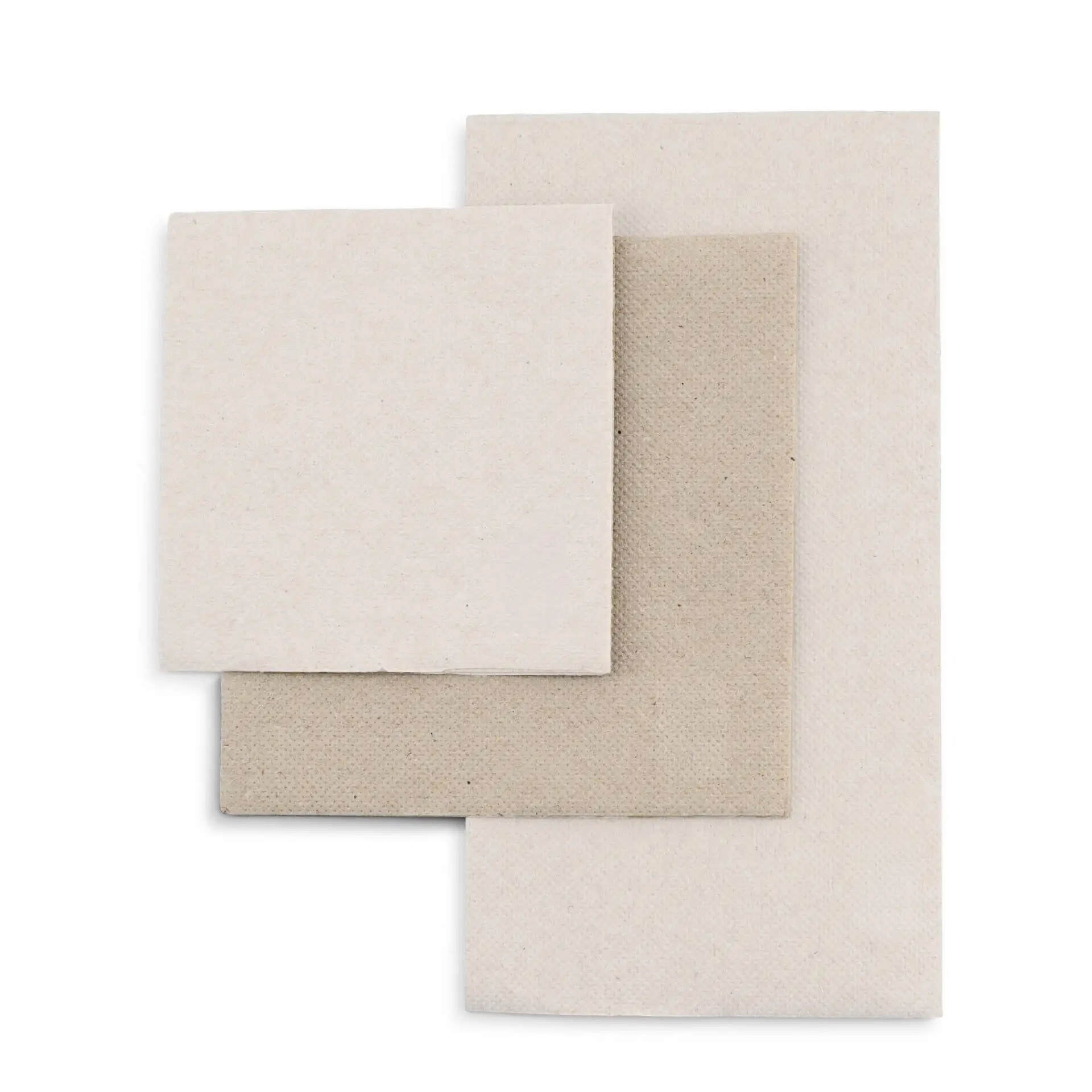 Three unbleached recycled paper napkins in square shapes, varying in size, displayed together.
