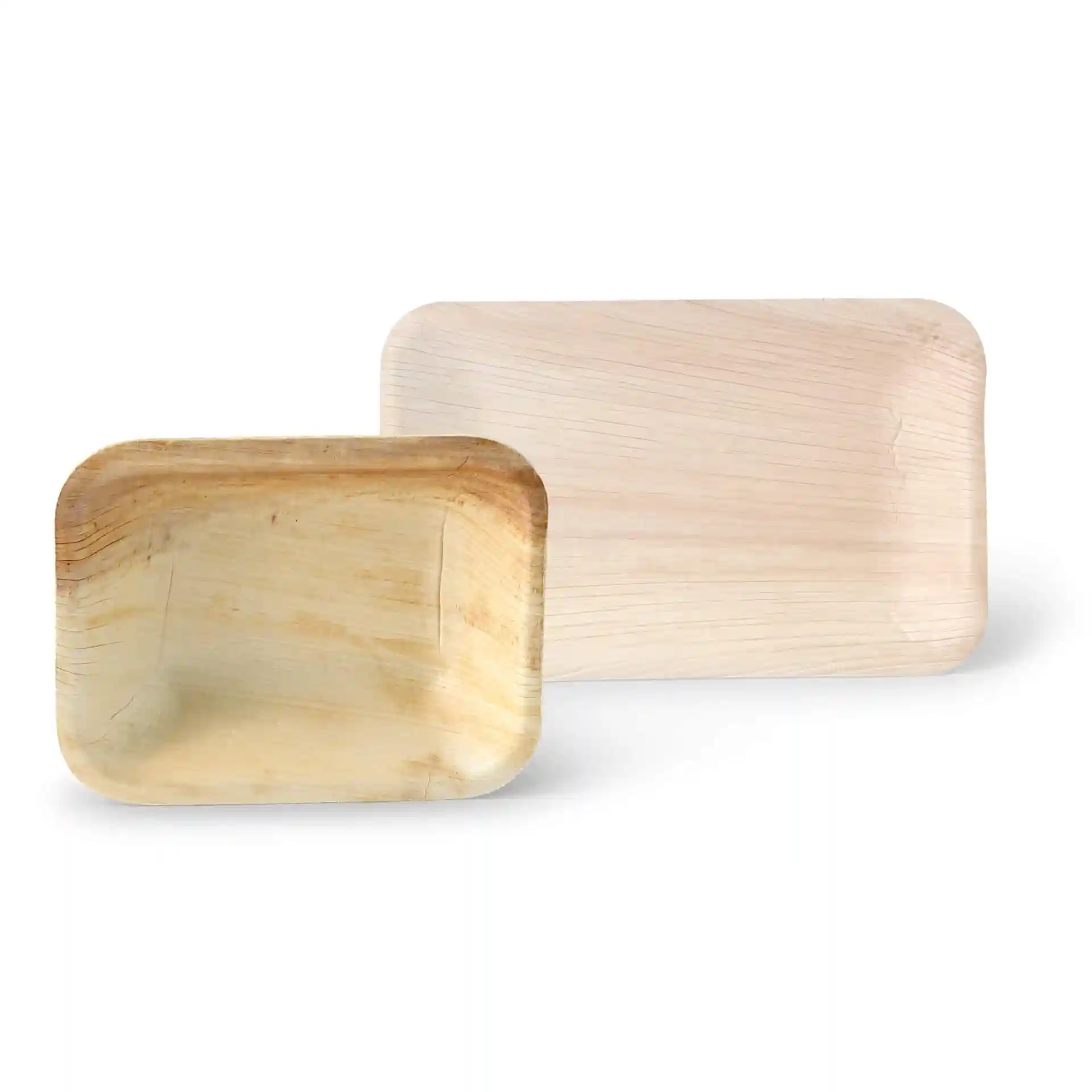 Two rectangular palm leaf plates in varying shades, one deep and the other shallow, placed side by side.
