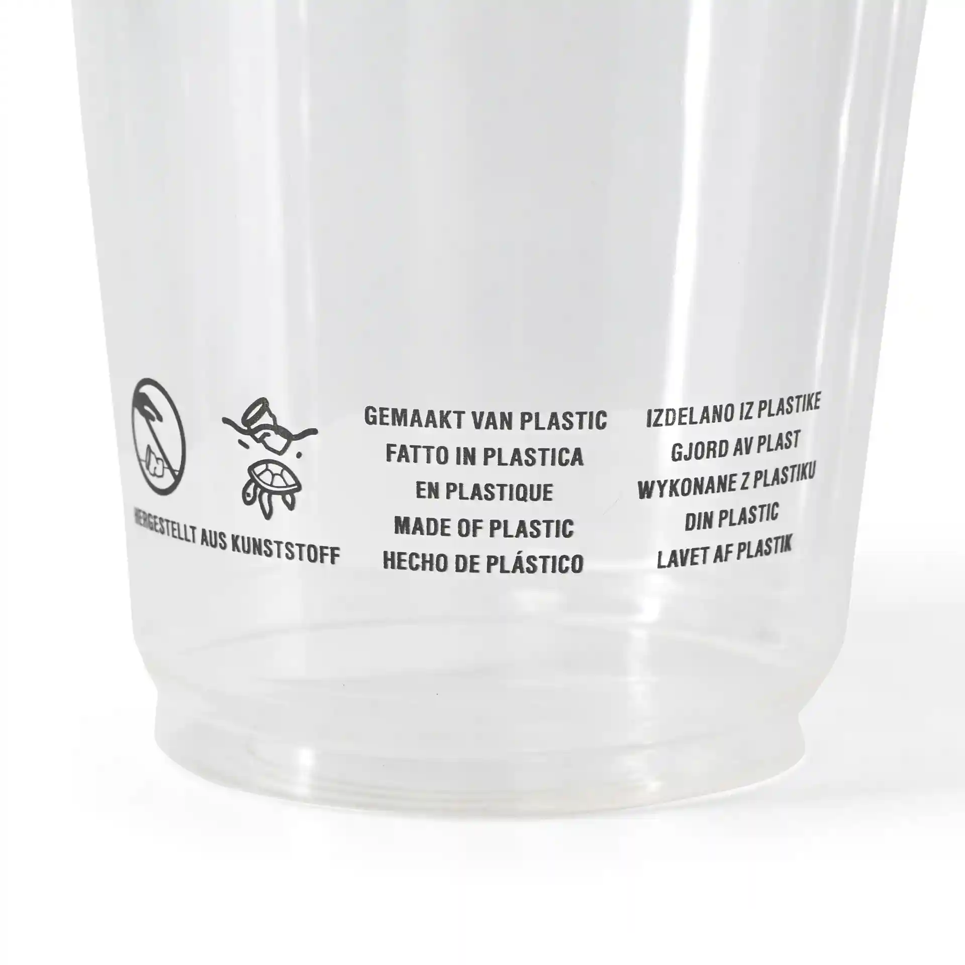 Klarer Plastikbecher mit bedrucktem mehrsprachigem Text zu Material und Gebrauchsanweisungen.