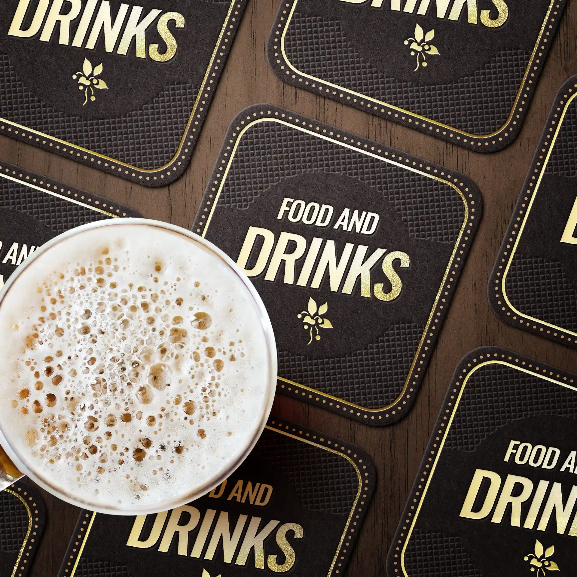 Image of a glass of beer on printed coasters featuring the text "Food and Drinks," arranged on a wooden surface.