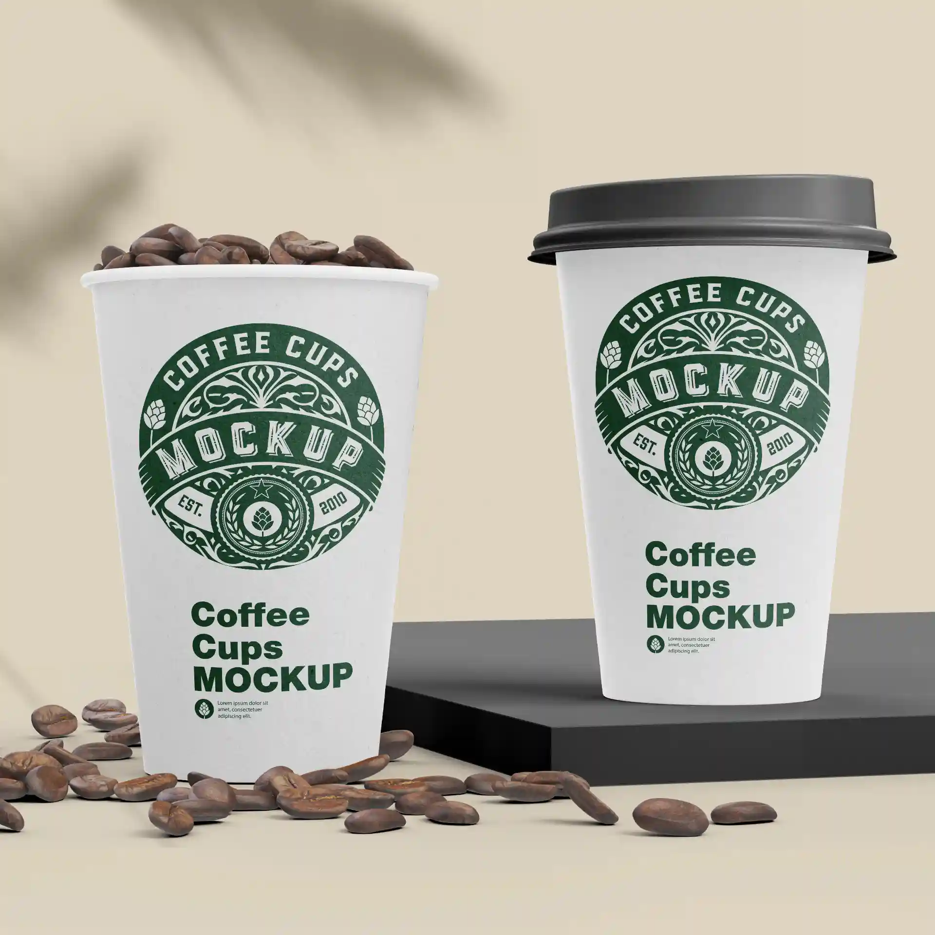 Mockup of two white paper coffee cups with green logo, one with a lid, surrounded by coffee beans on a black surface.