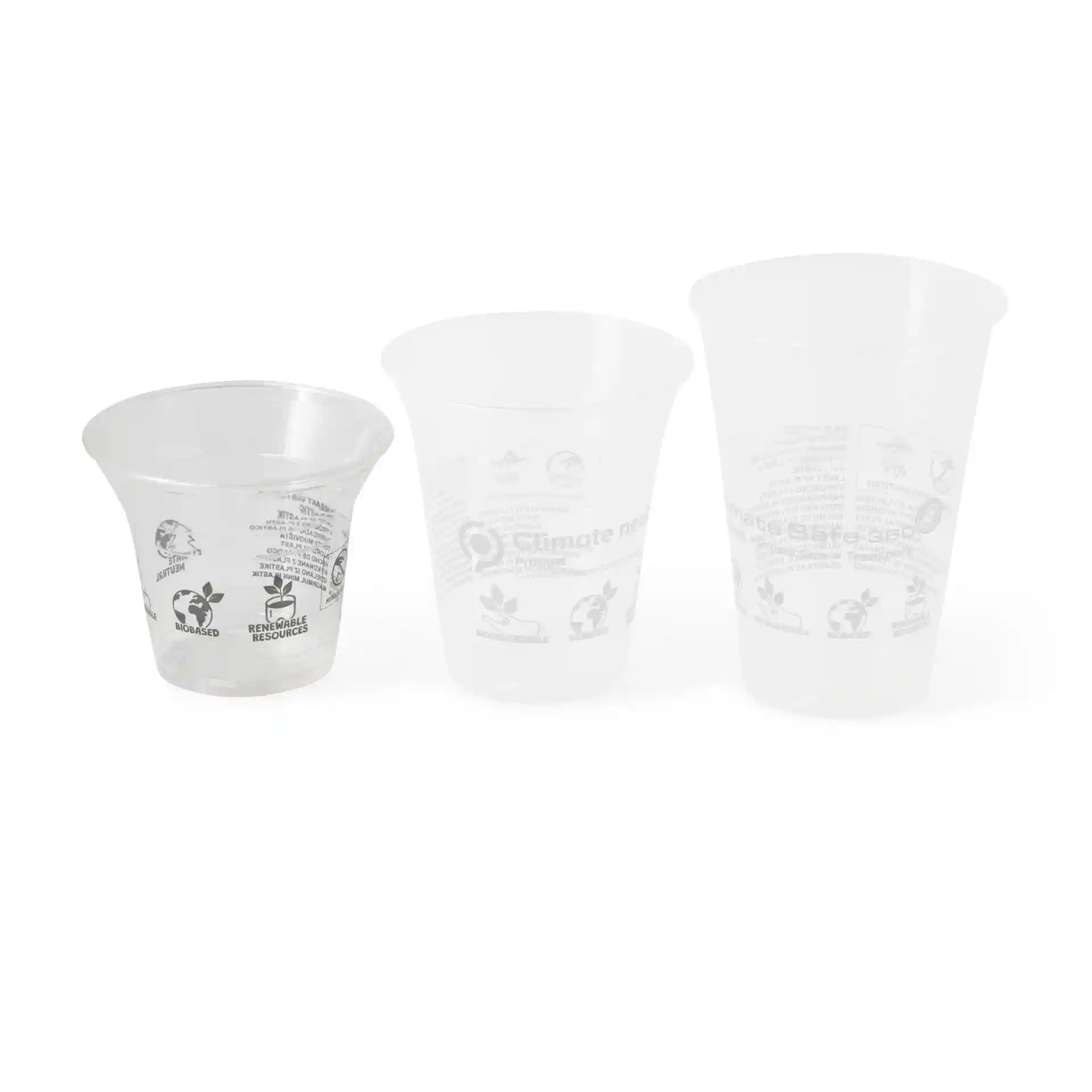 Transparent PLA smoothie cups in three sizes, showing printed markings and symbols on the surface.