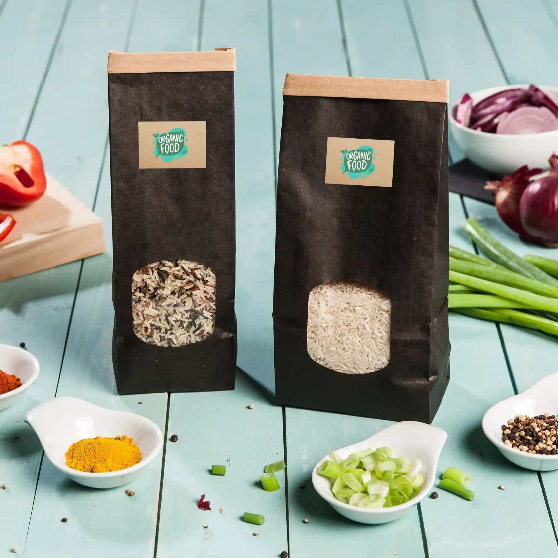 Two bags of rice, one with a window showing mixed rice and the other with white rice, on a wooden surface with spices and vegetables.