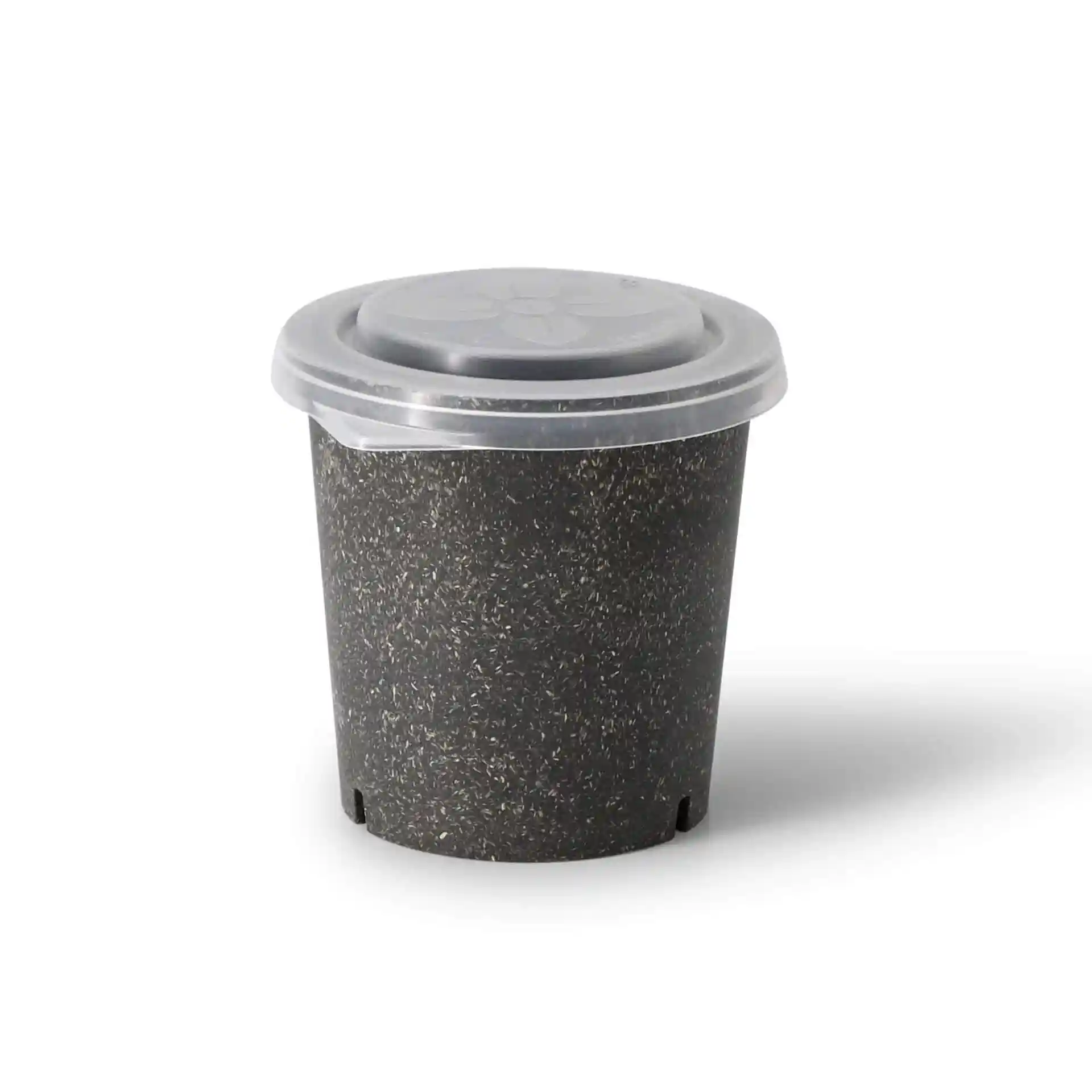 Round black cup with a transparent lid, featuring a smooth surface and small holes at the bottom.