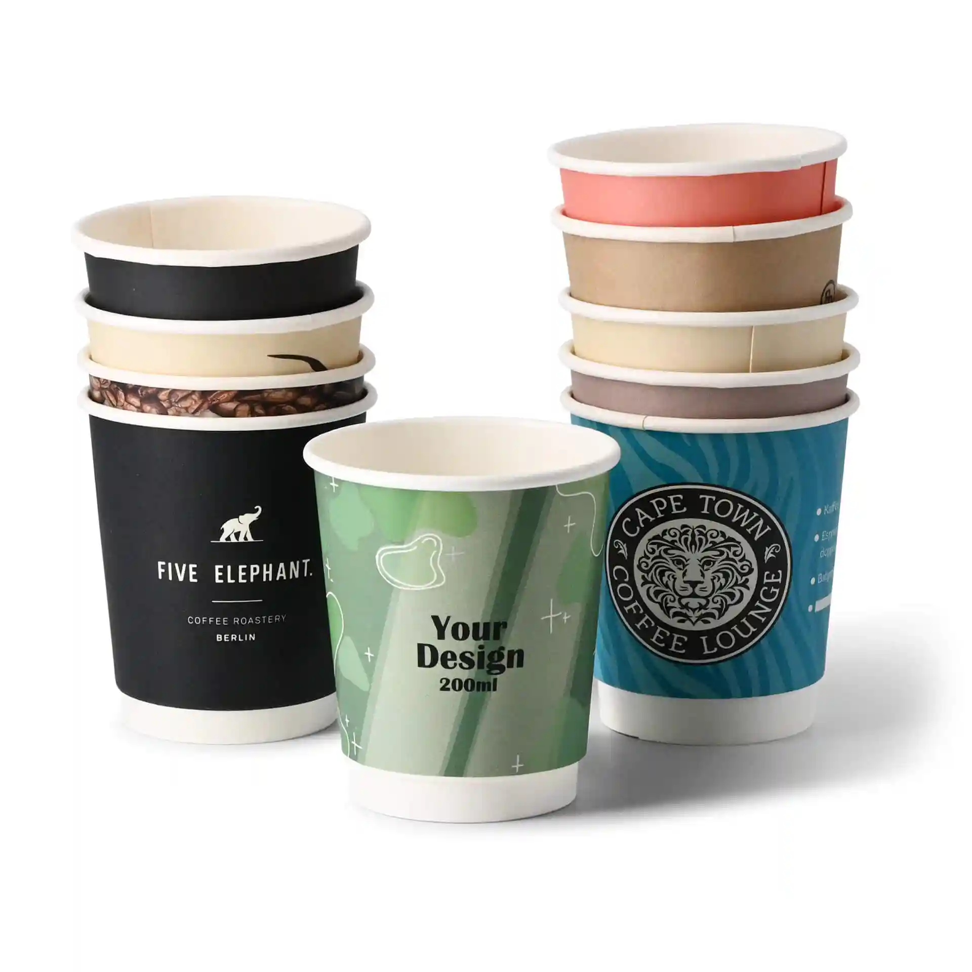 Stack of various custom printed paper cups, including a green cup with "Your Design" and a black cup with "Five Elephant."