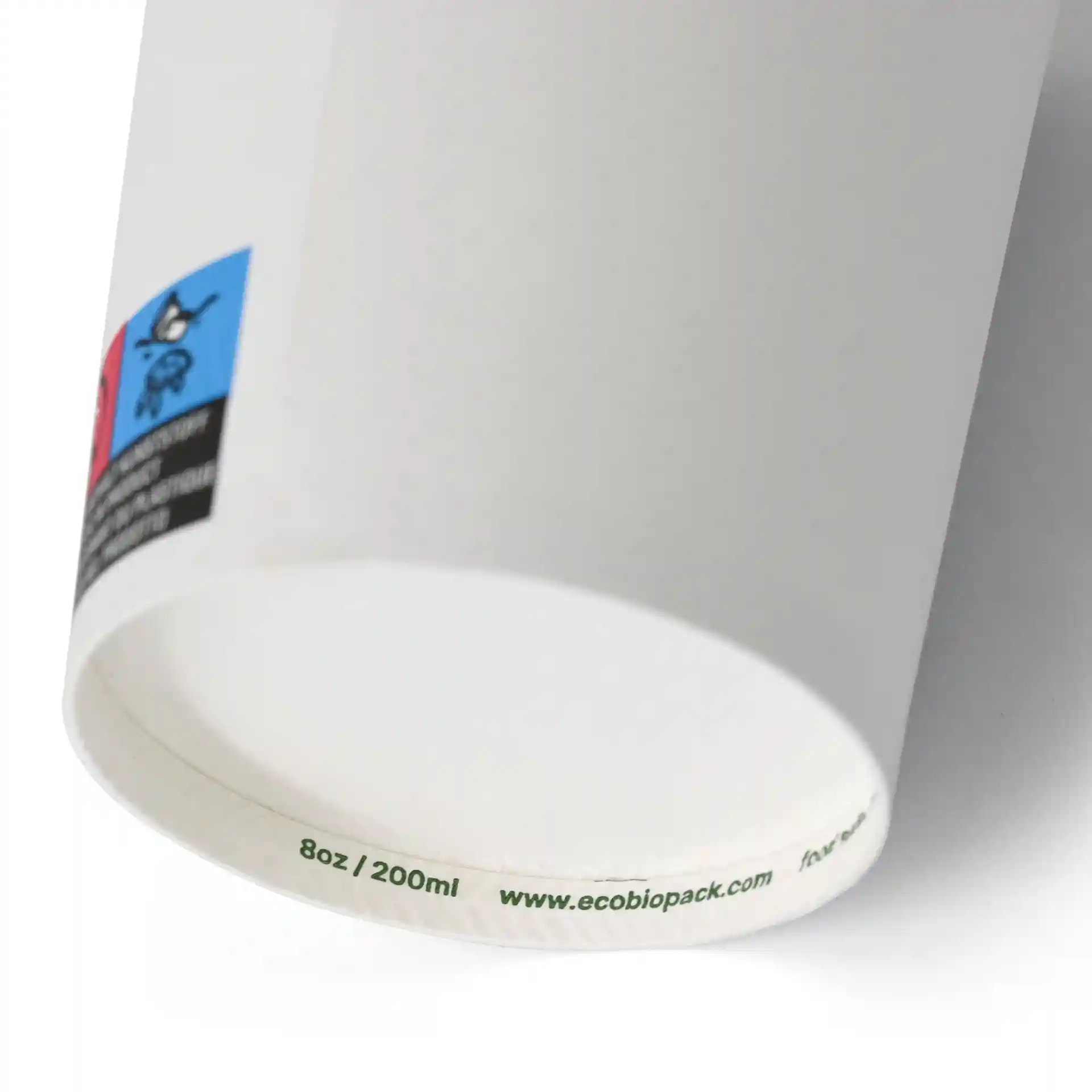 White single wall paper cup with a diameter of 80 mm and a height of 90 mm, showing a label and markings on the bottom.