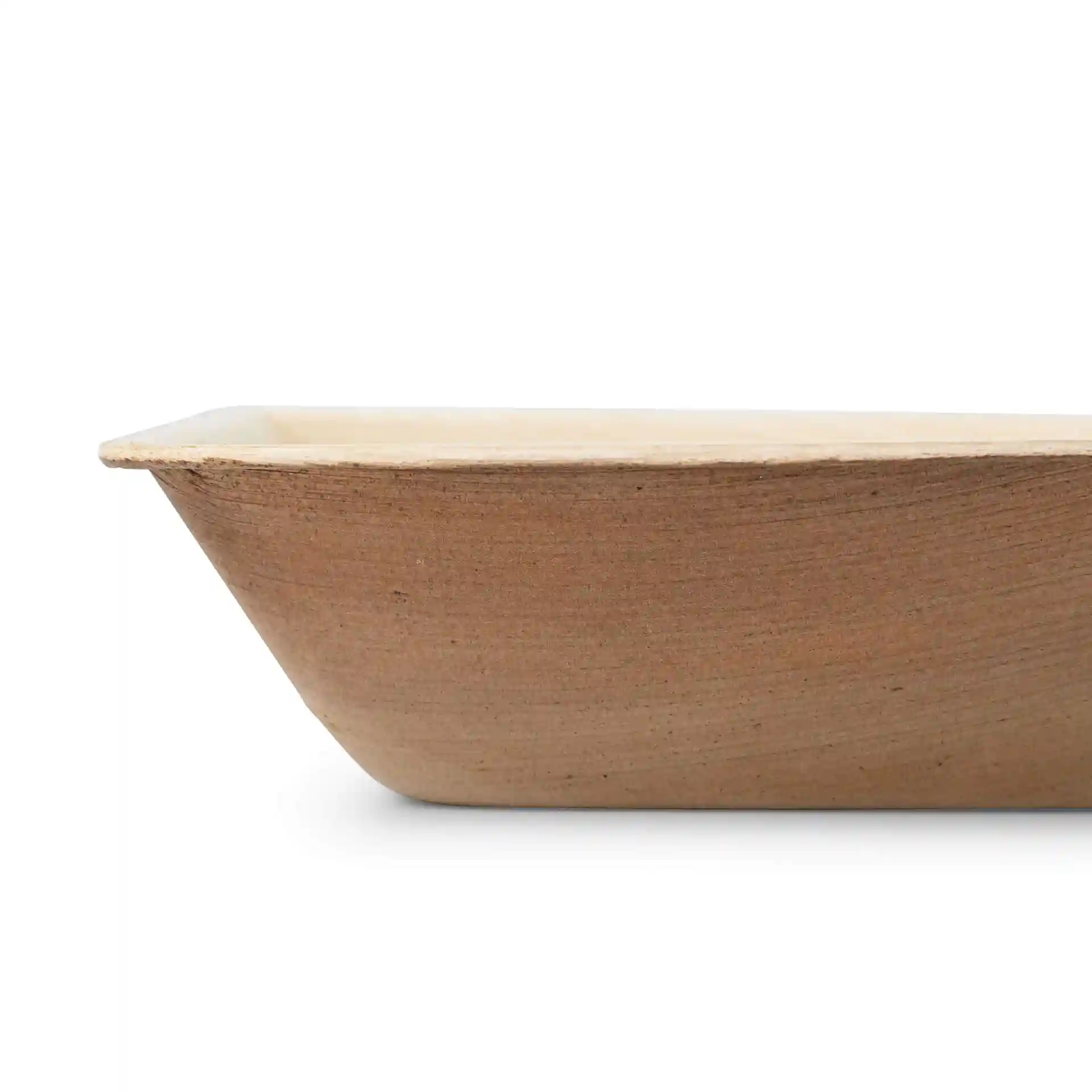 Rectangular palm leaf bowl with a grain texture, showing a side view and a shallow profile.