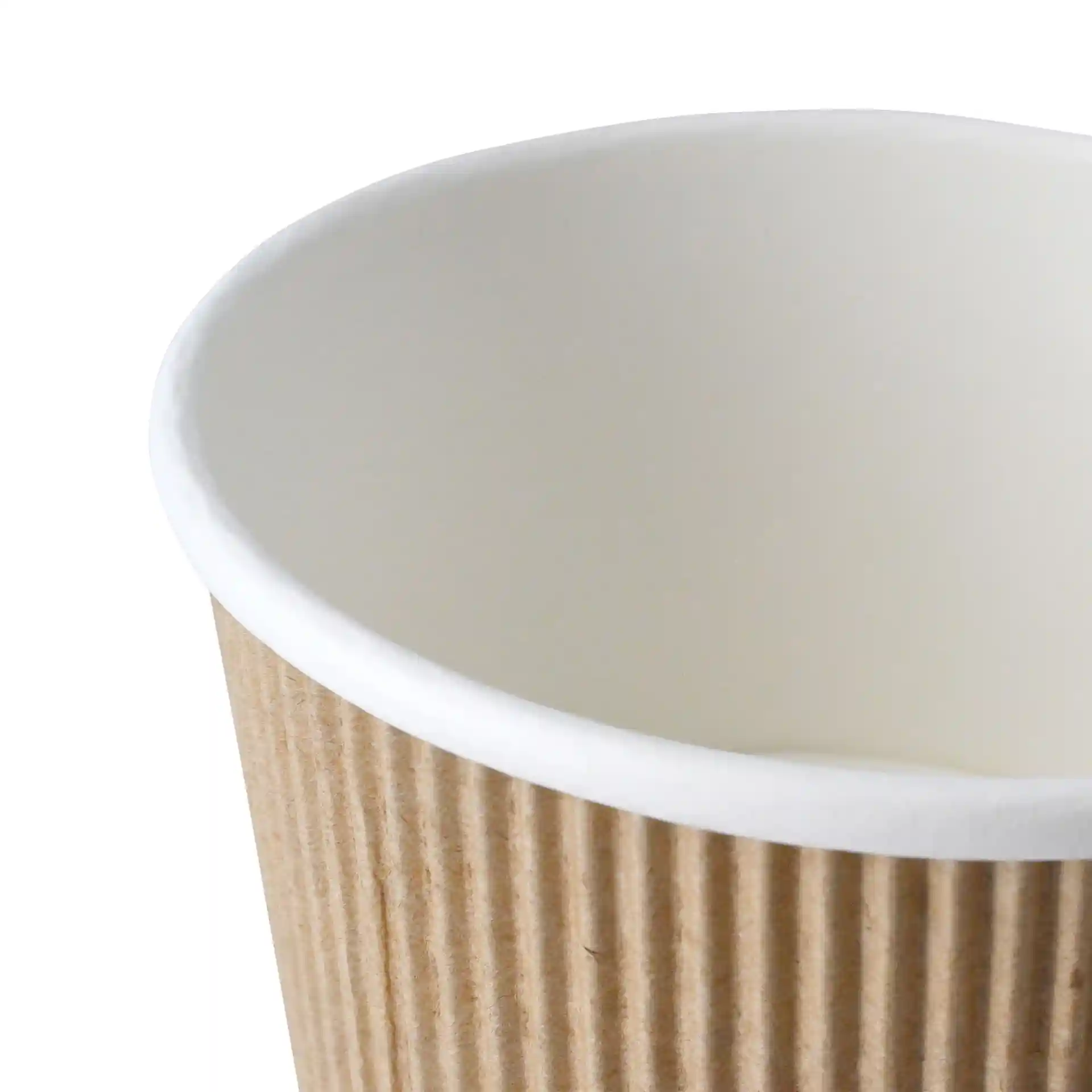 Close-up of a brown ribbed cardboard soup cup with a white inner coating, showing the top edge and interior.