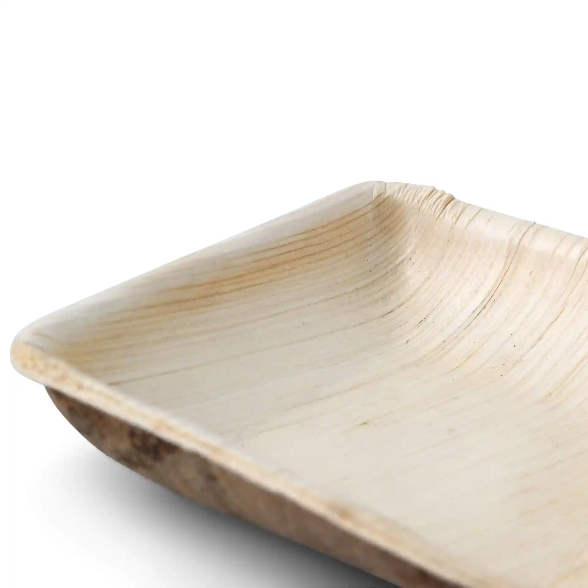Square palm leaf bowl with a grain texture, showing a deep design and no coating.