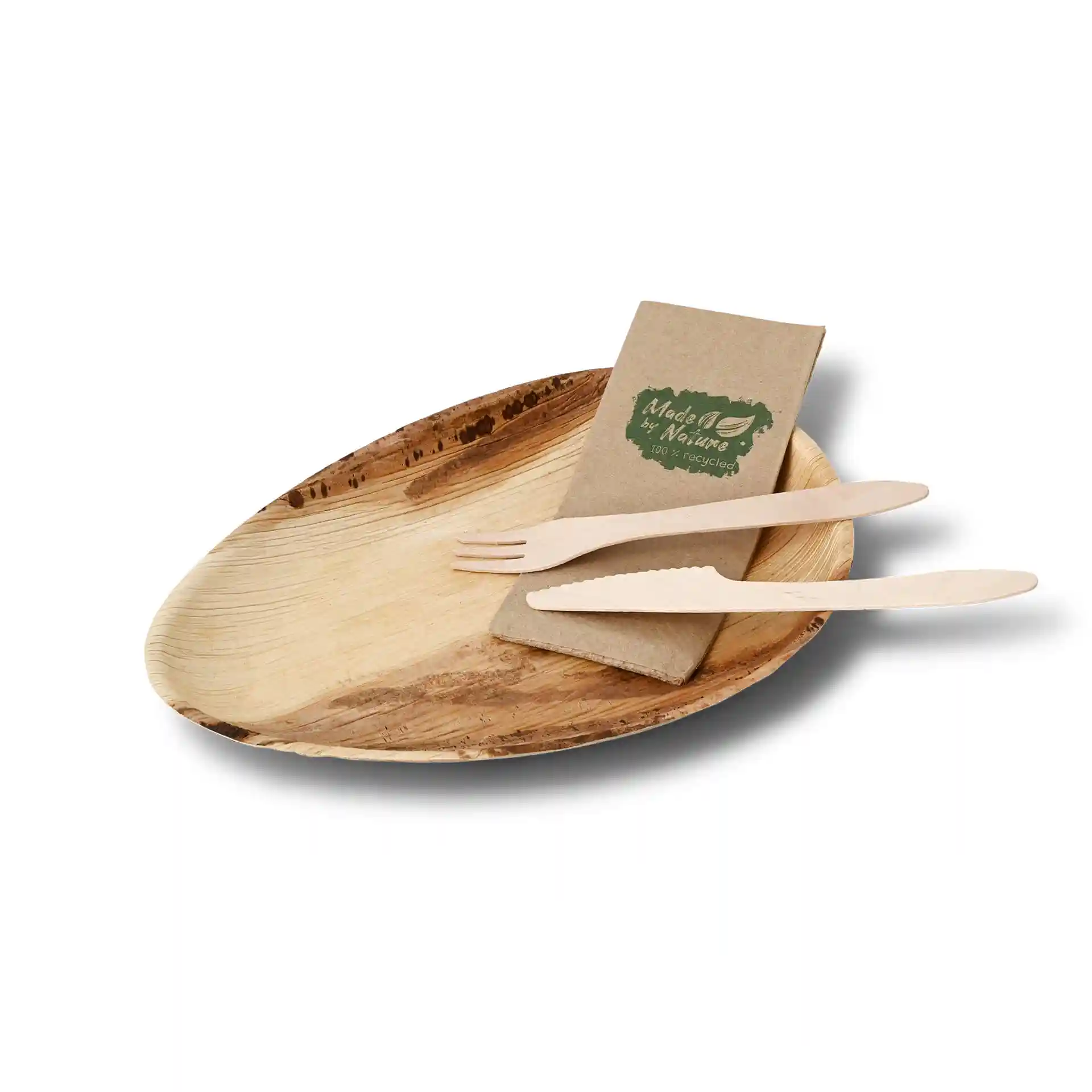 Oval palm leaf plate with a grain finish, accompanied by a napkin and two wooden utensils.