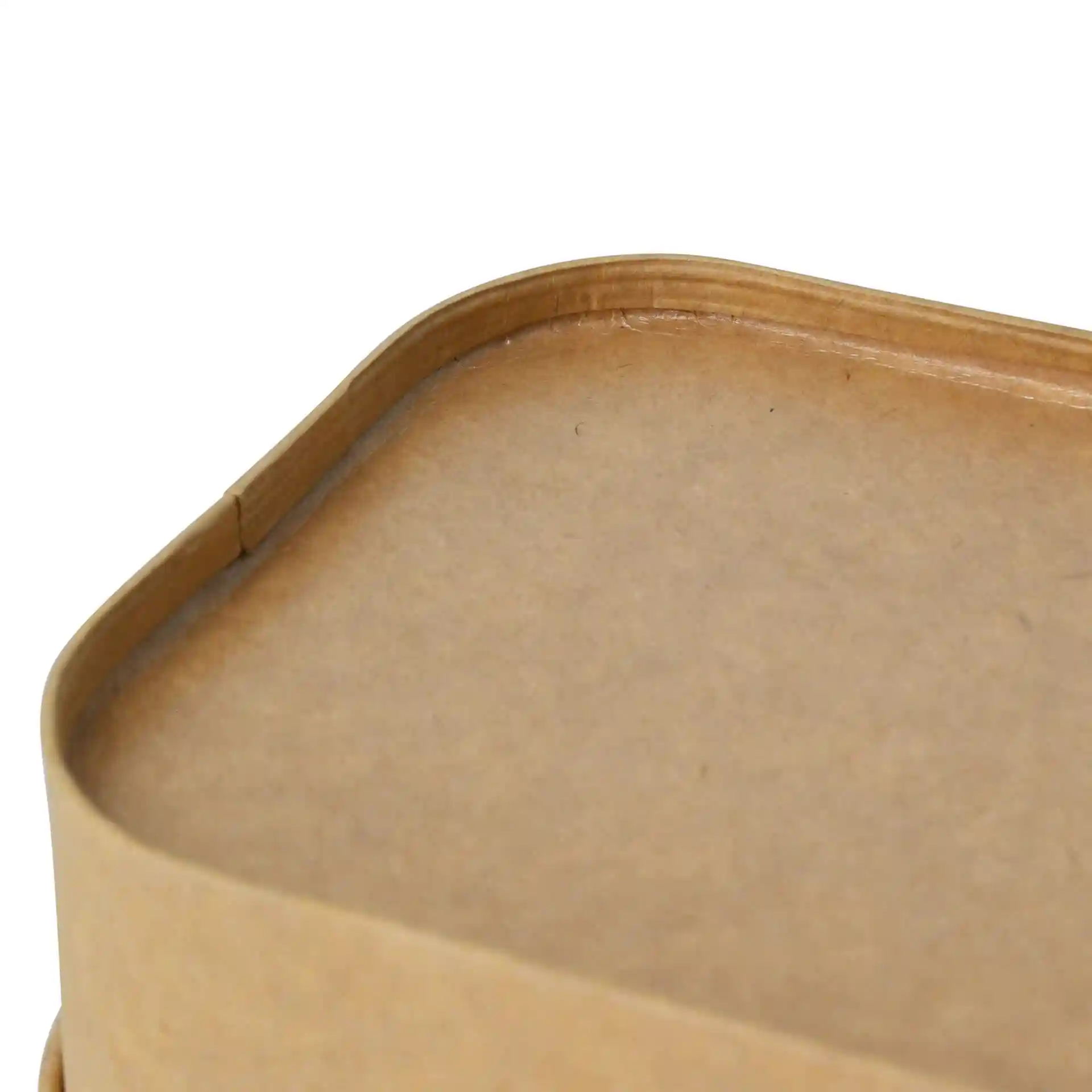 Close-up of the top edge of a rectangular kraft cardboard food container.
