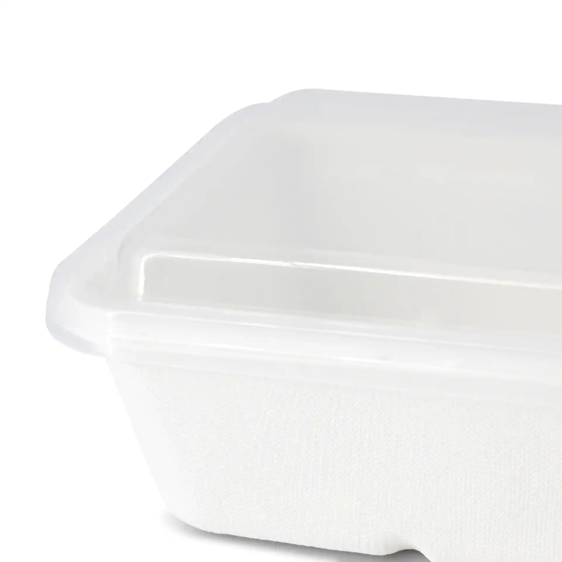 Transparent rectangular PP lid, 17 x 12 cm, with a height of 7 mm, partially visible from an angle.