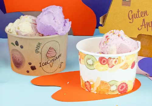 Ice cream cup with whipped cream, chocolate pieces, and fresh strawberries, featuring a customizable green design.