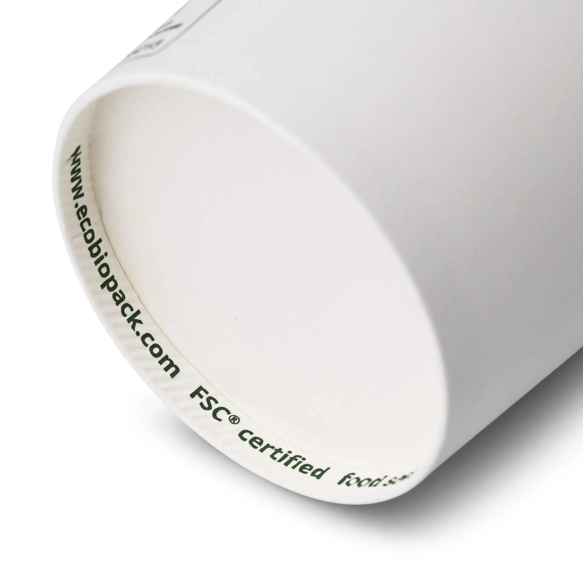 White paper cup with a round shape, showing the inner rim and a printed label with markings.