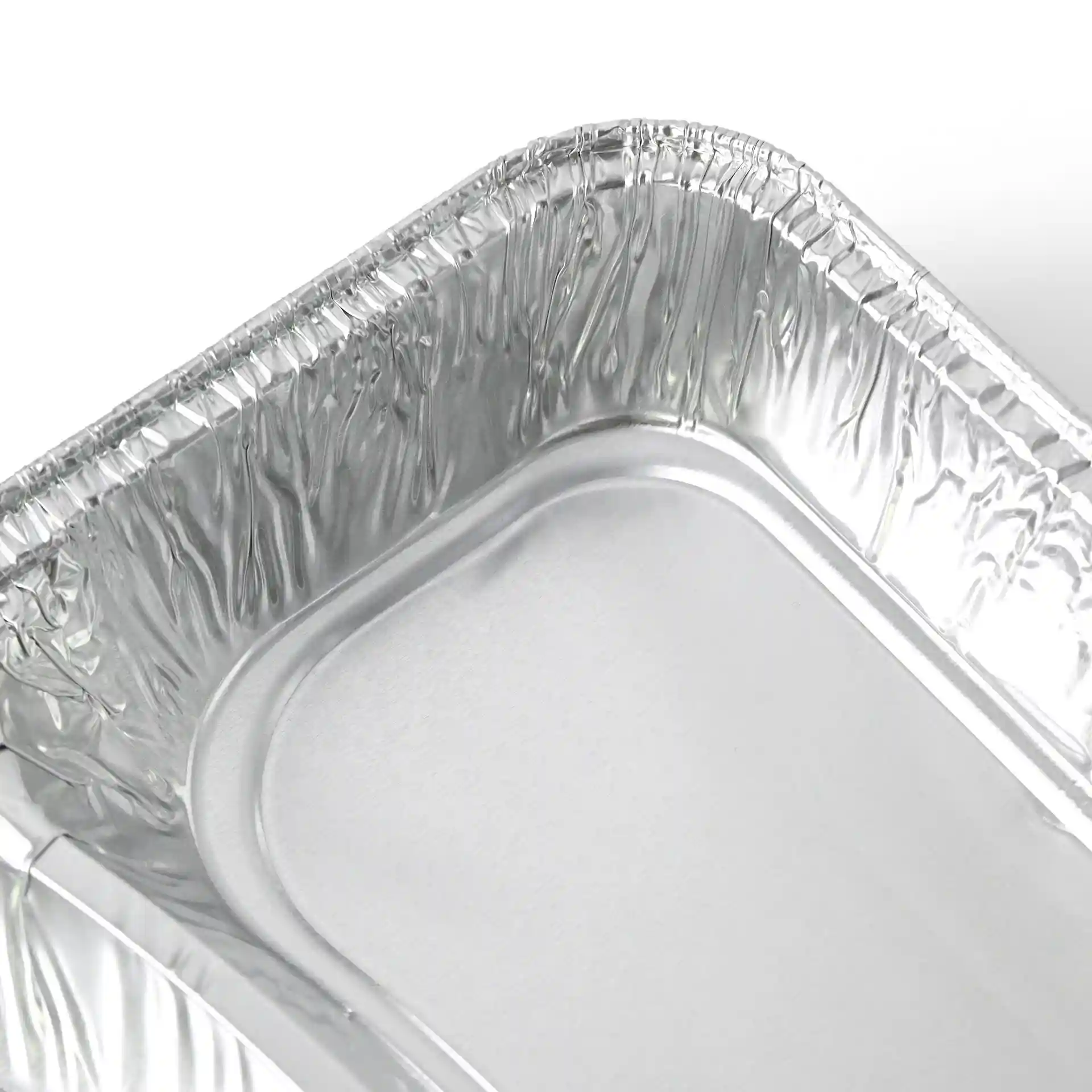 Rectangular aluminium meal tray with two compartments, measuring 22.7 x 17.7 x 3 cm.