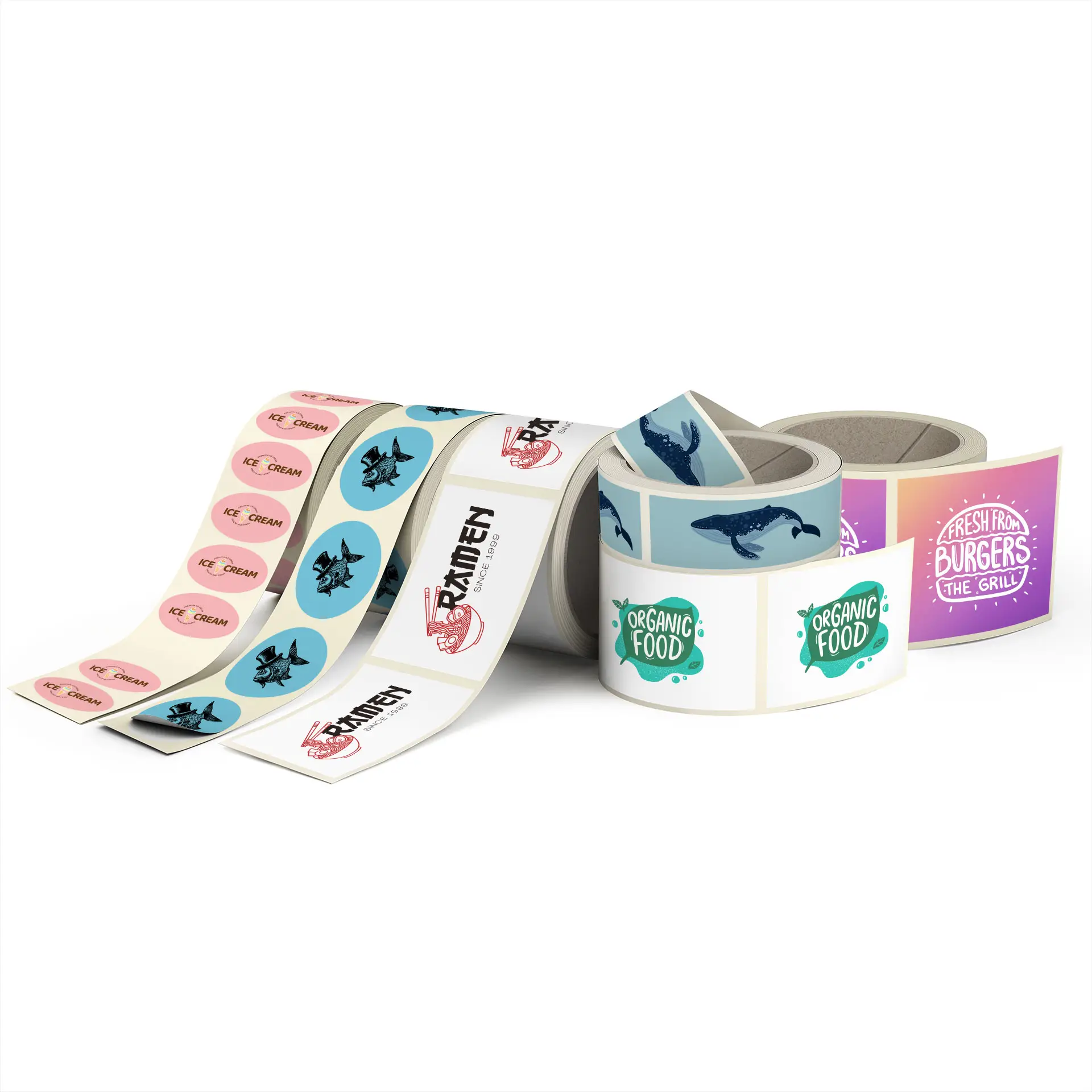 Custom printed label rolls on a white background, featuring various designs for food packaging, including organic and ice cream labels.