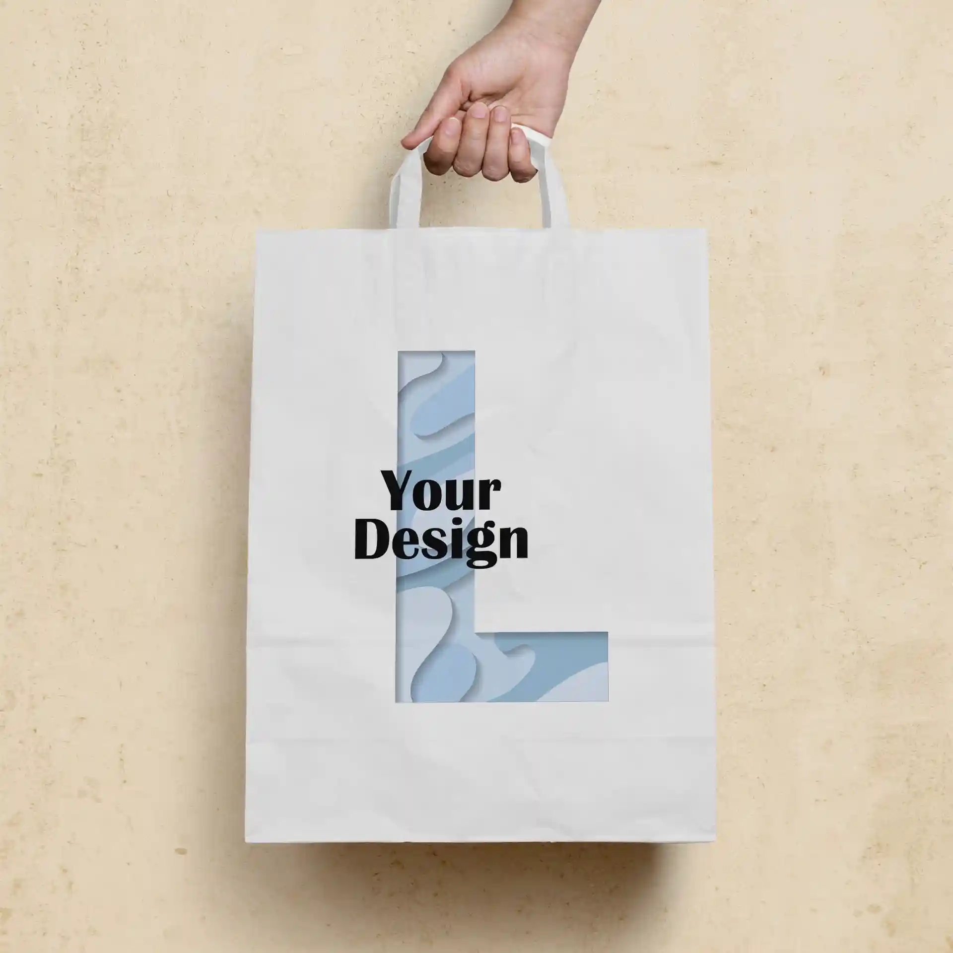 White paper carrier bag with a rectangular shape, featuring a cut-out design and a hand holding the handle.