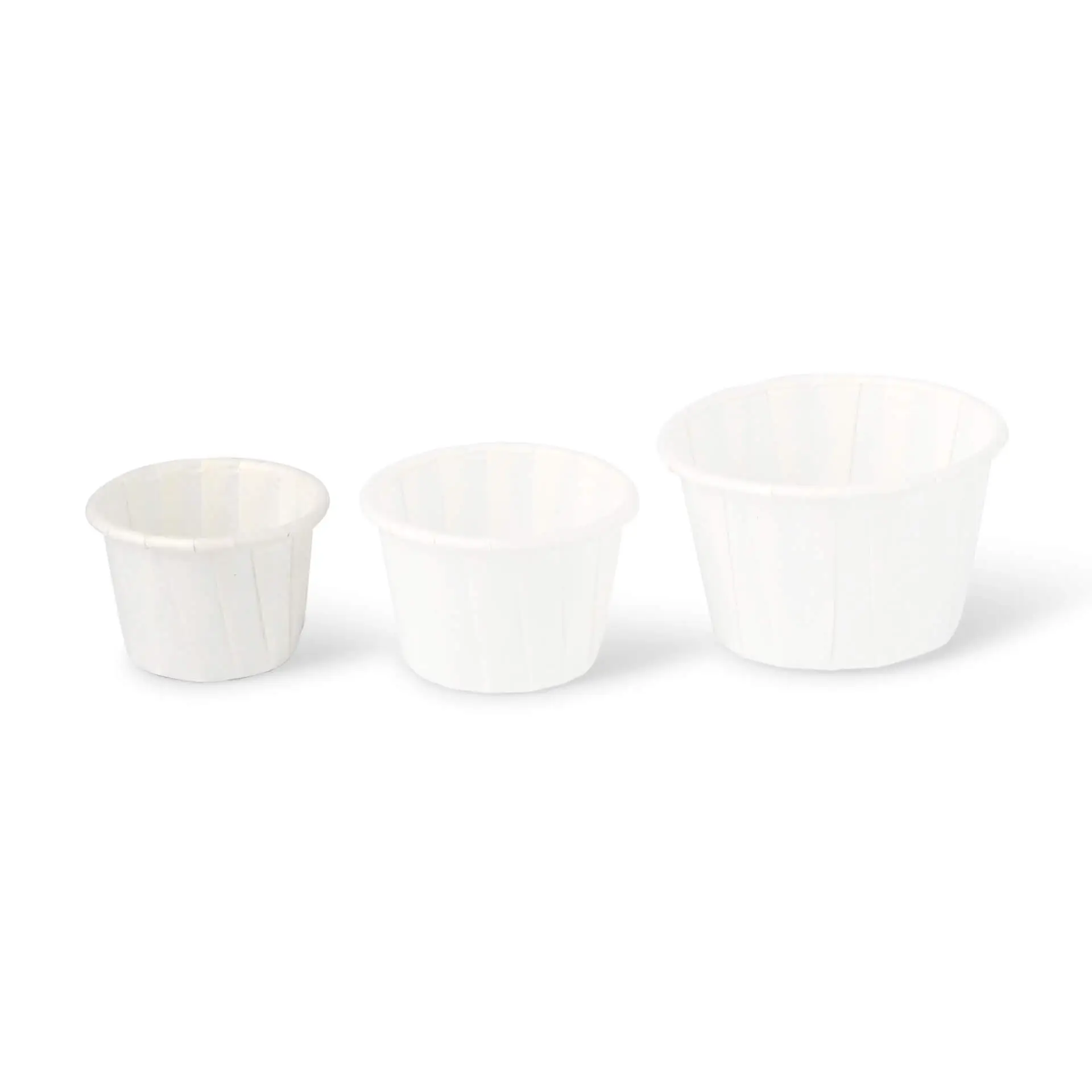Three white paper cups of different sizes, used for small portions like dips or sauces, placed on a plain background.