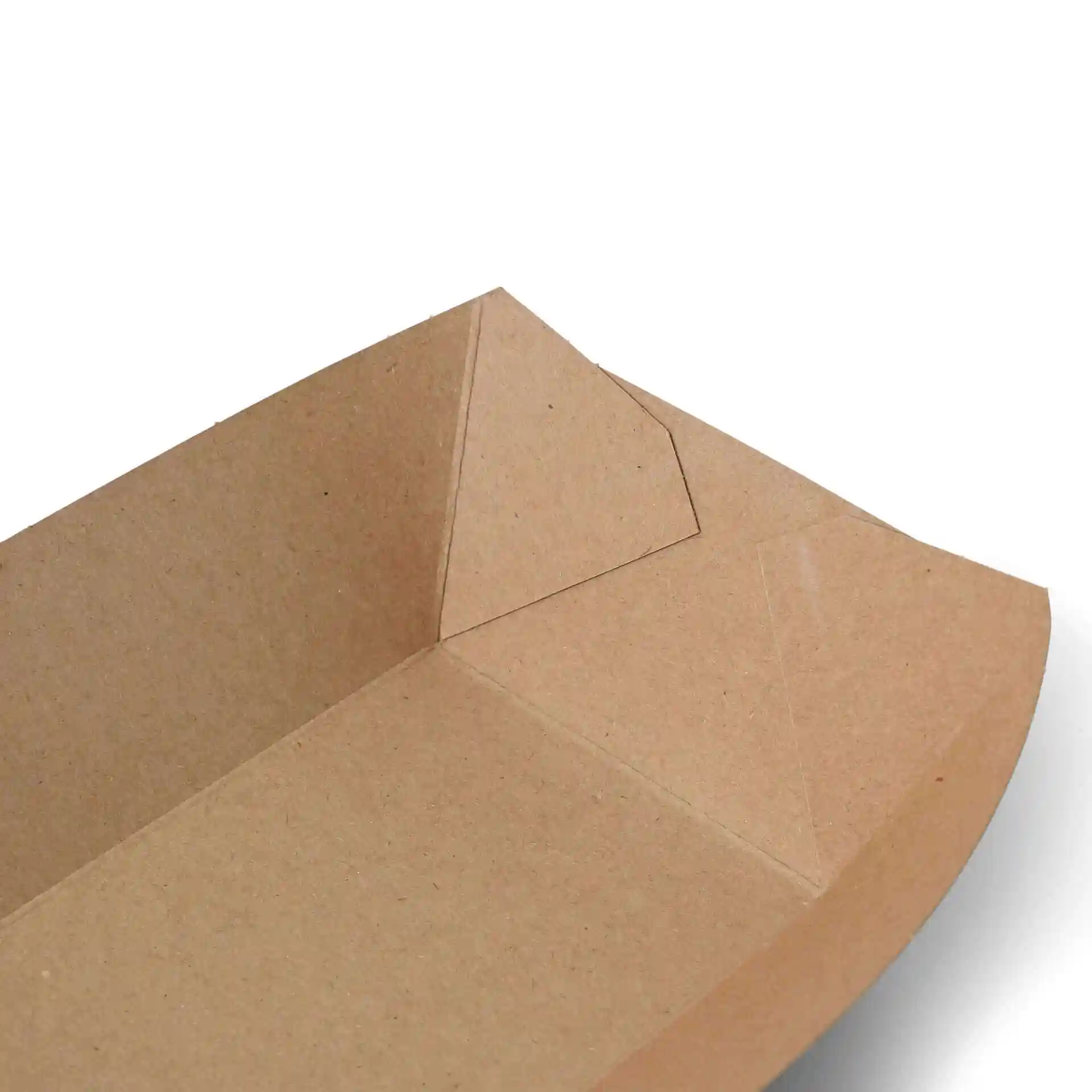 Close-up of a brown cardboard food tray with a rectangular shape and visible corner folds.