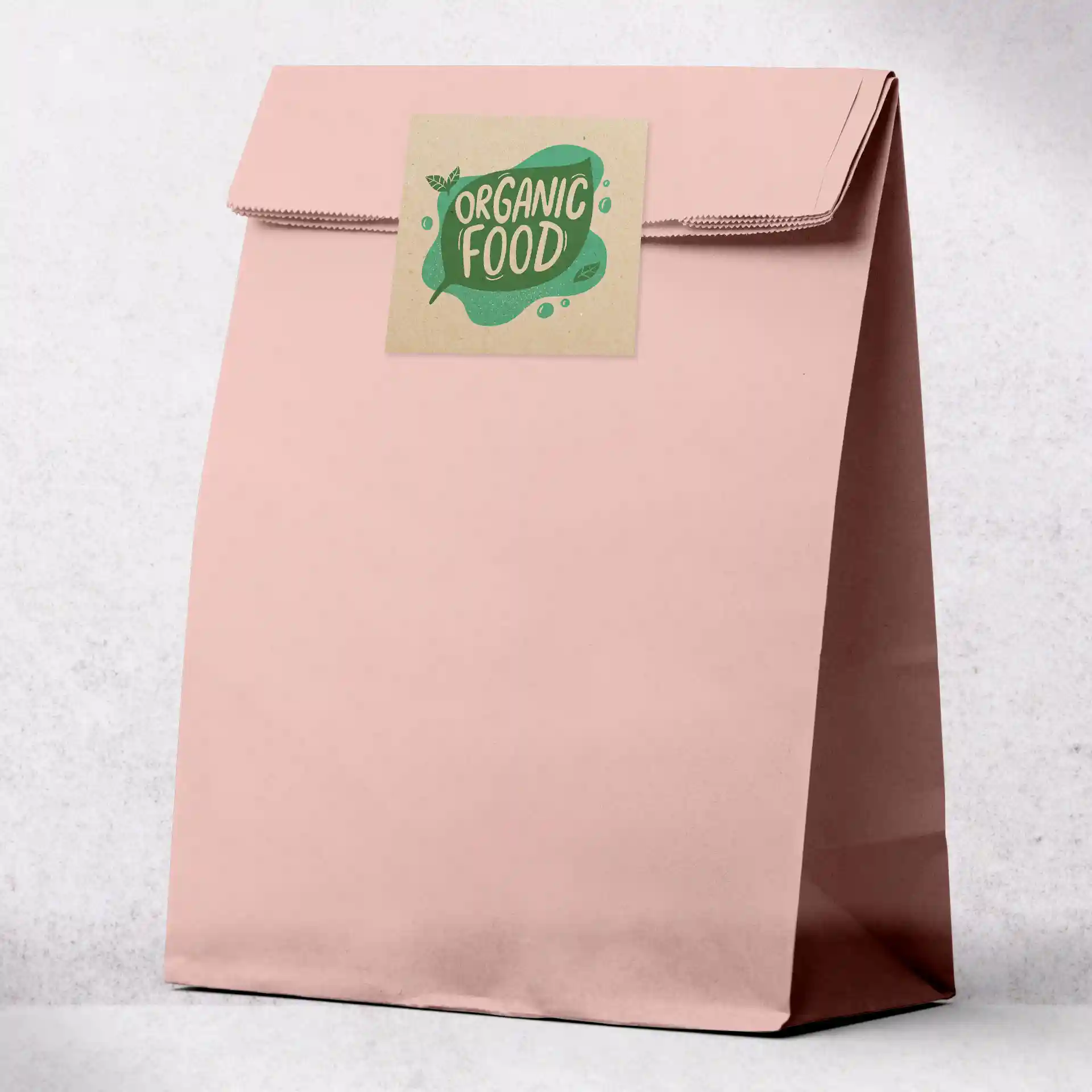 Pink paper bag with a square label featuring green text and design, labeled as "Organic Food."