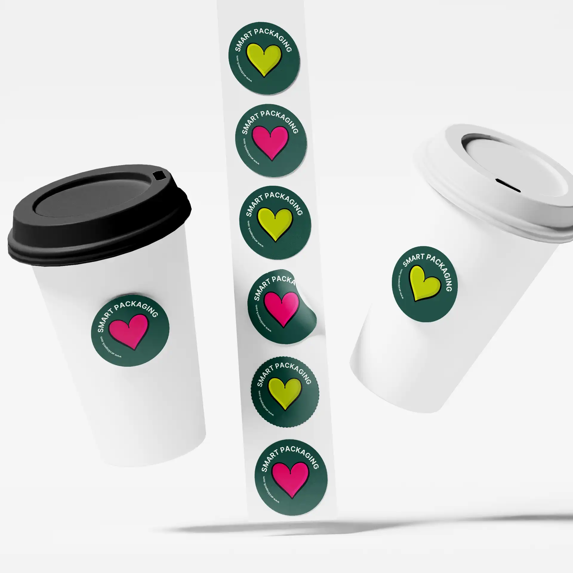 White coffee cups with black and white lids featuring circular QR code stickers on a vertical strip.