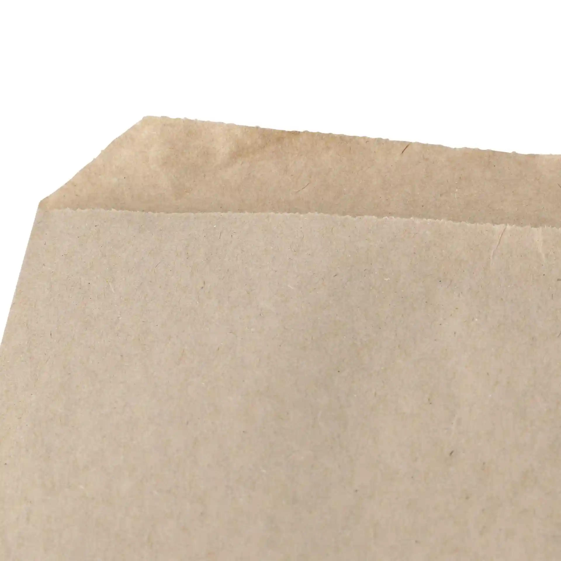 Close-up of the top edge of a brown kraft paper flat bag, showing a folded and cut design.