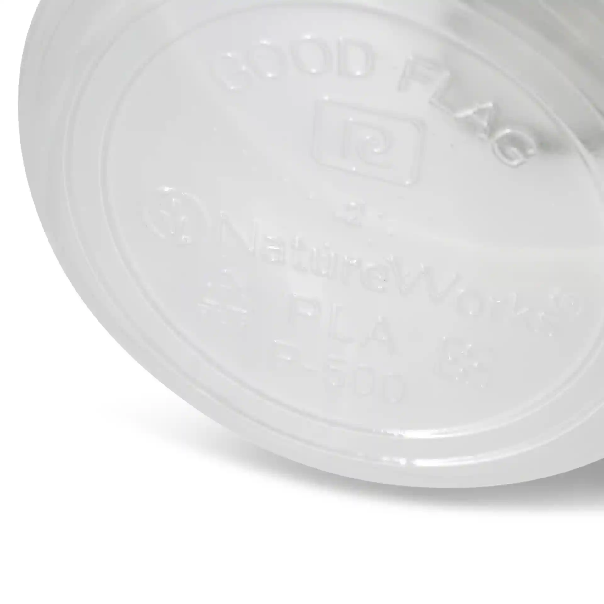 Transparent round deli container base with embossed markings, including brand and material information.