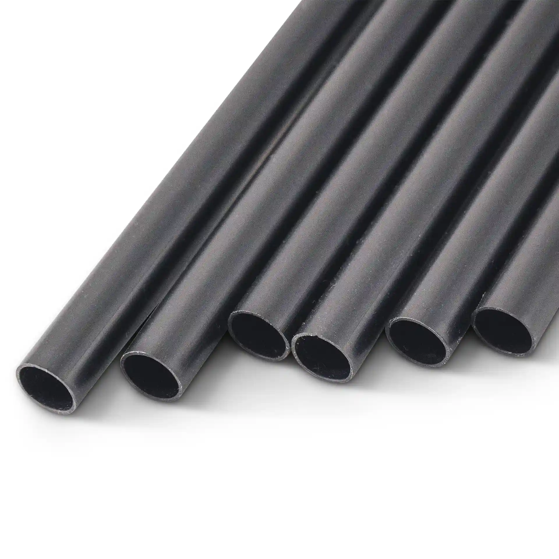 Black reusable cocktail straws, 15 cm long and 0.7 cm in diameter, arranged in a group.