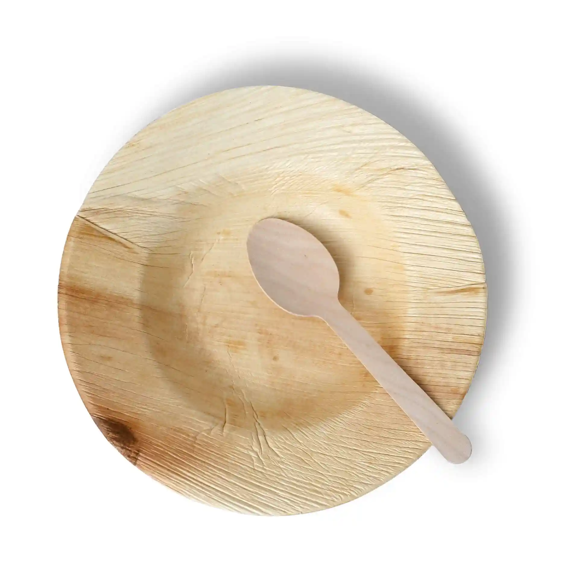 Round palm leaf plate with a deep design, 23 cm in diameter, accompanied by a wooden spoon.